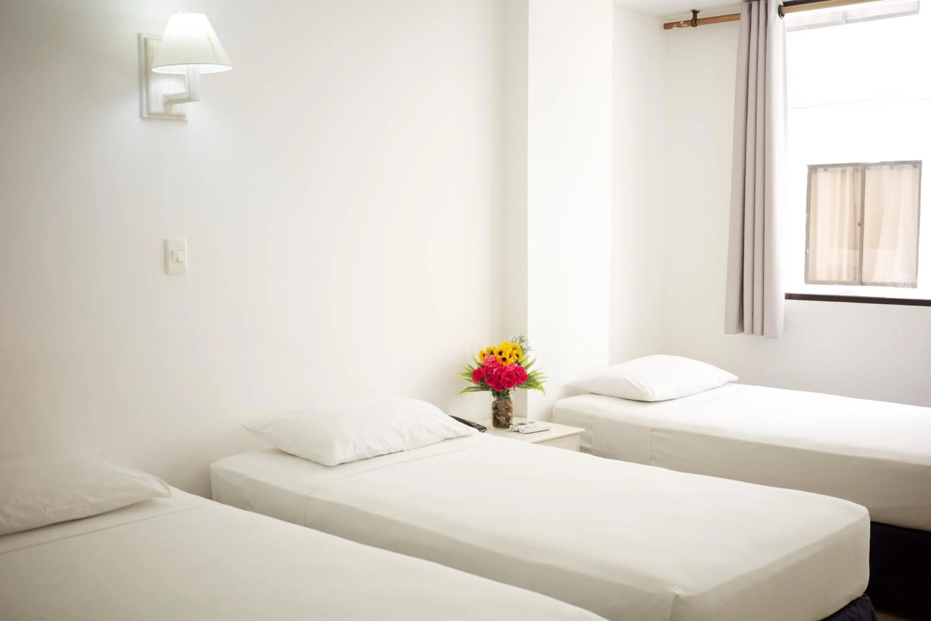 Bed in Hotel La Riviera