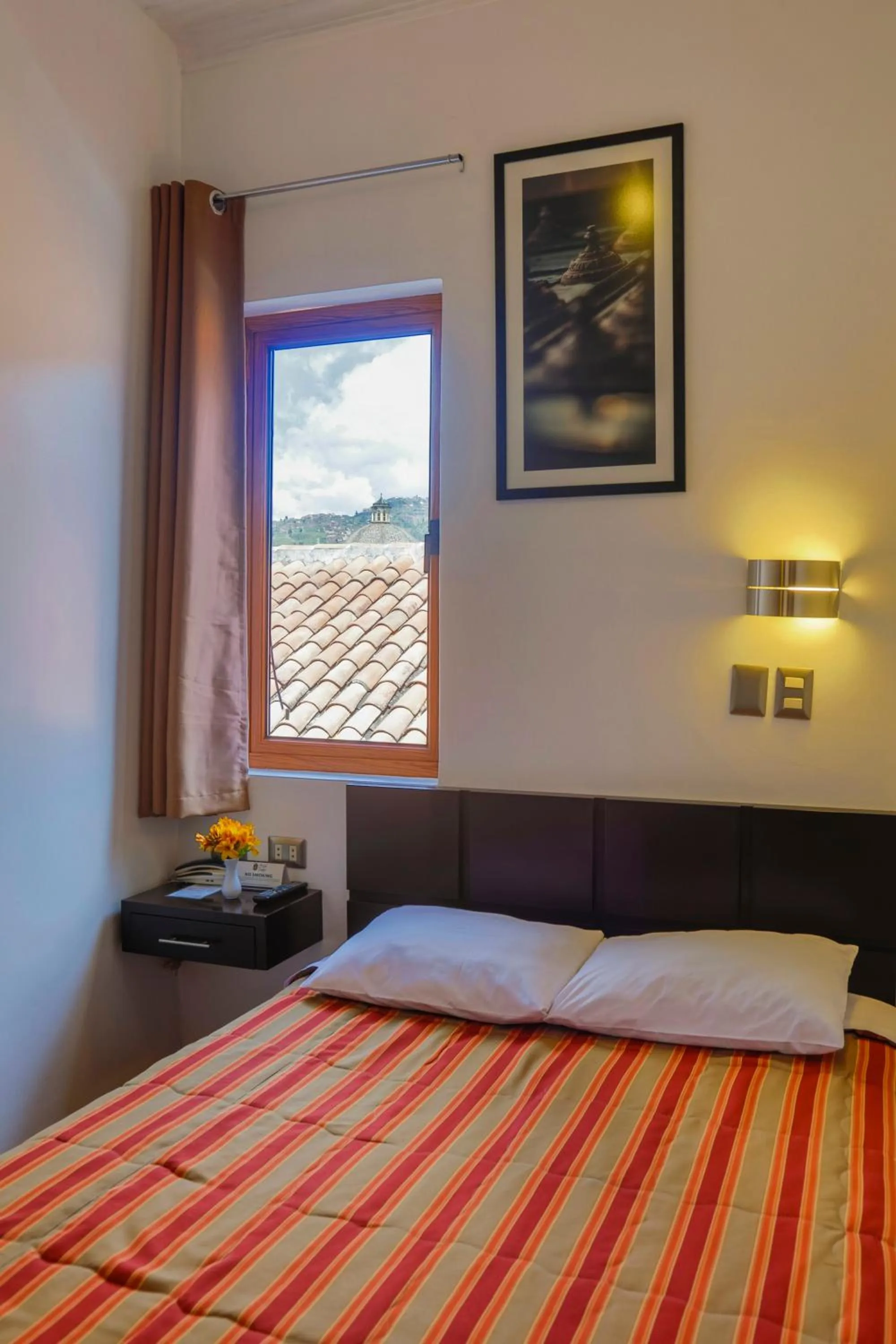 Photo of the whole room, Bed in Hostal & Apartments El Triunfo