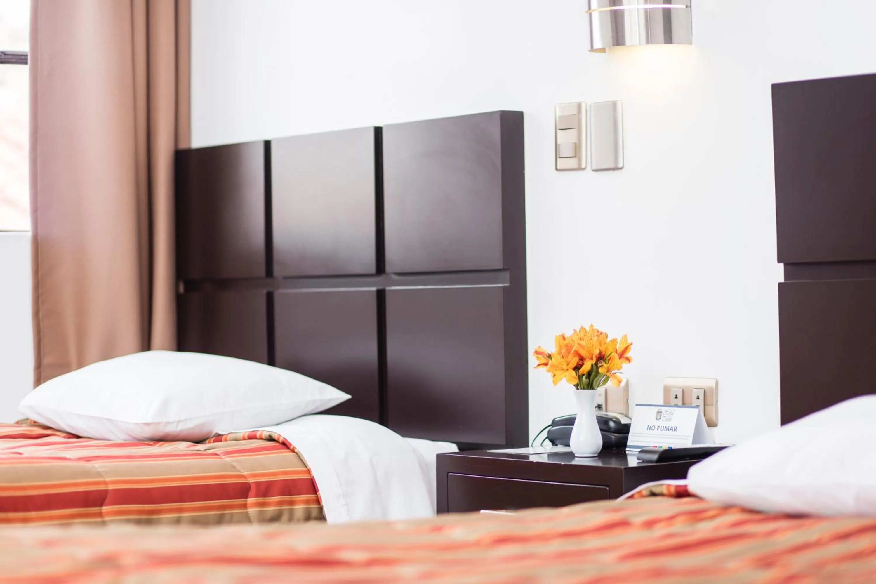 Photo of the whole room, Bed in Hostal & Apartments El Triunfo