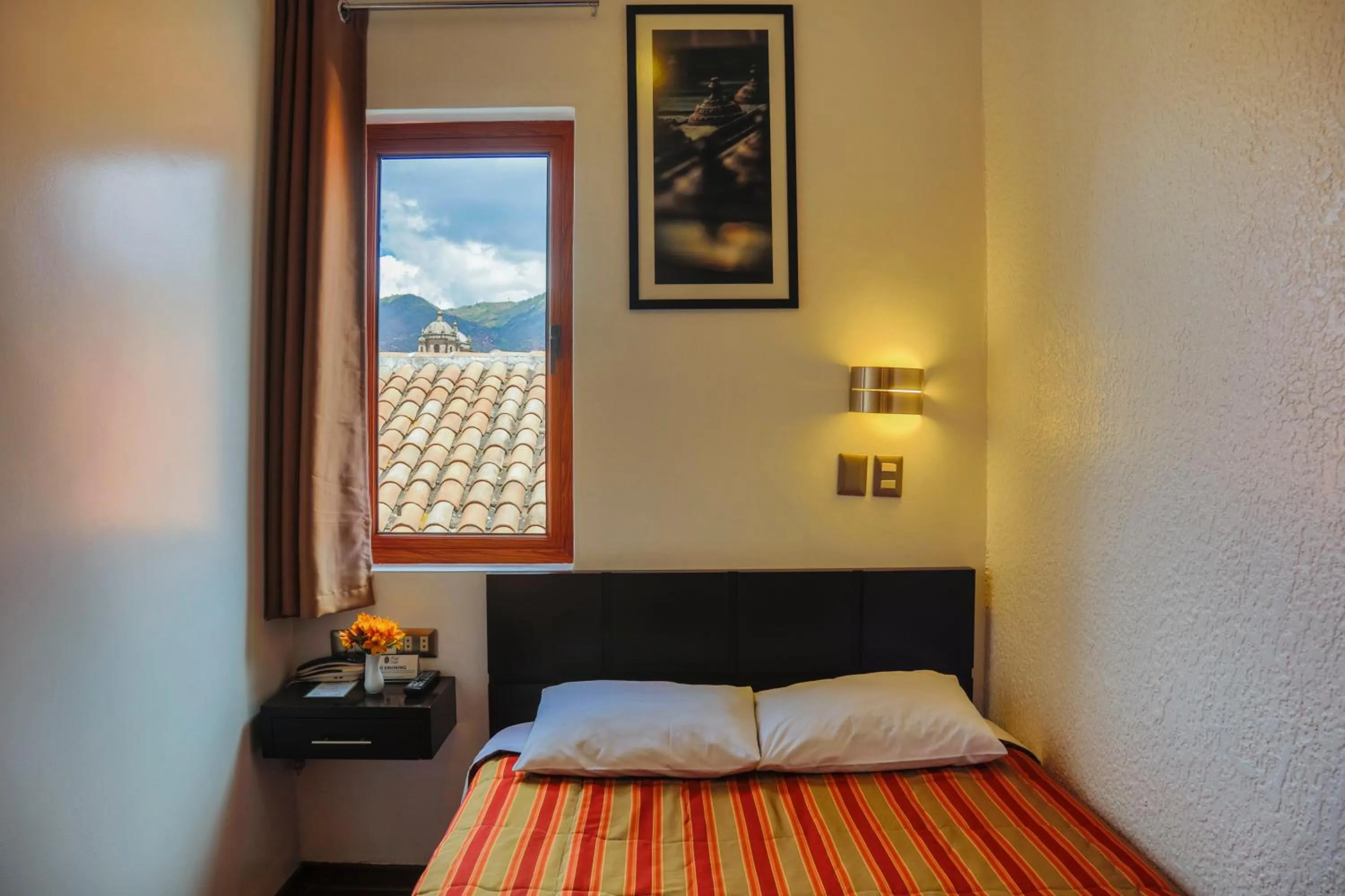 Photo of the whole room, Bed in Hostal & Apartments El Triunfo