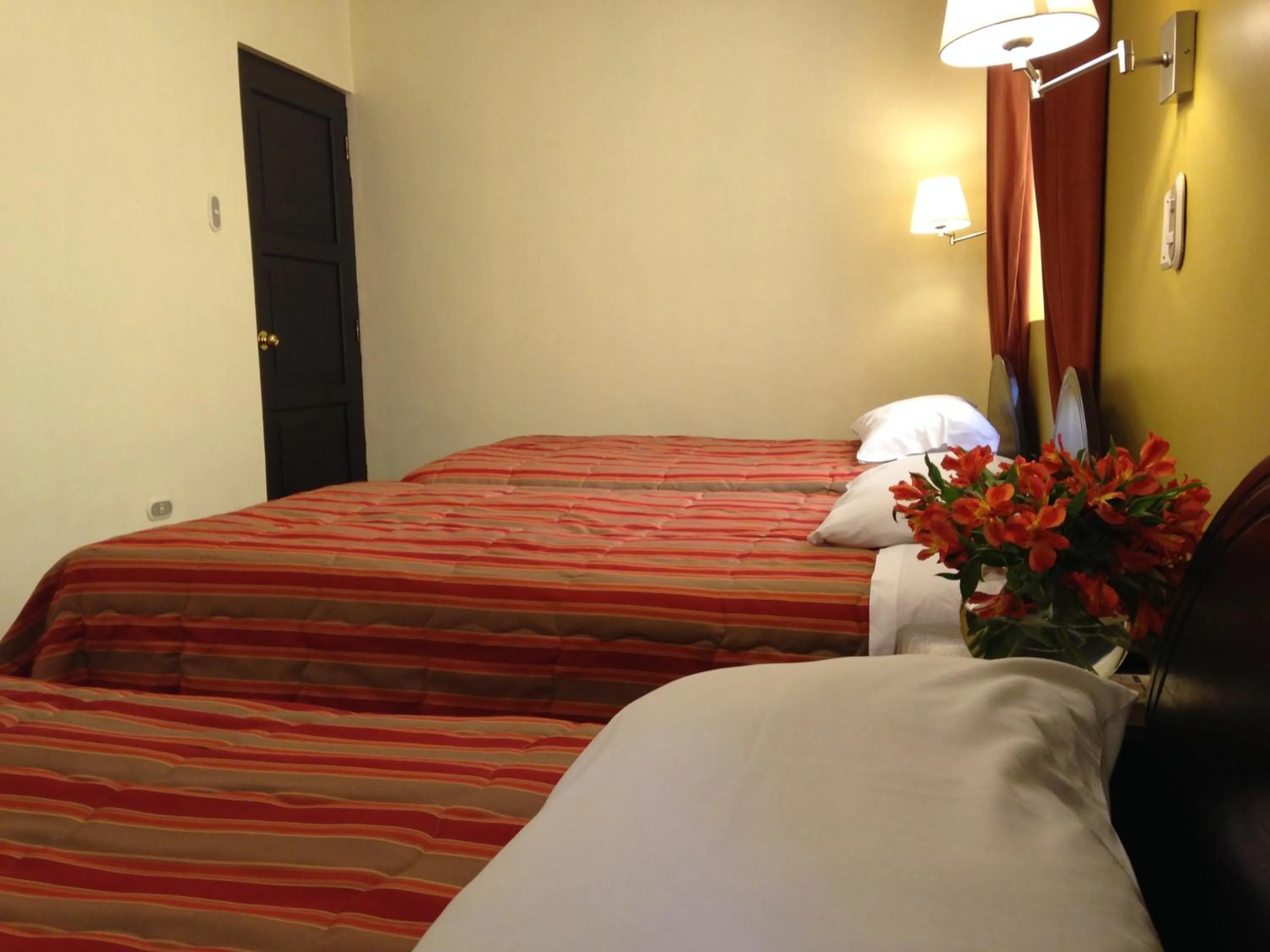 Photo of the whole room, Bed in Hostal & Apartments El Triunfo