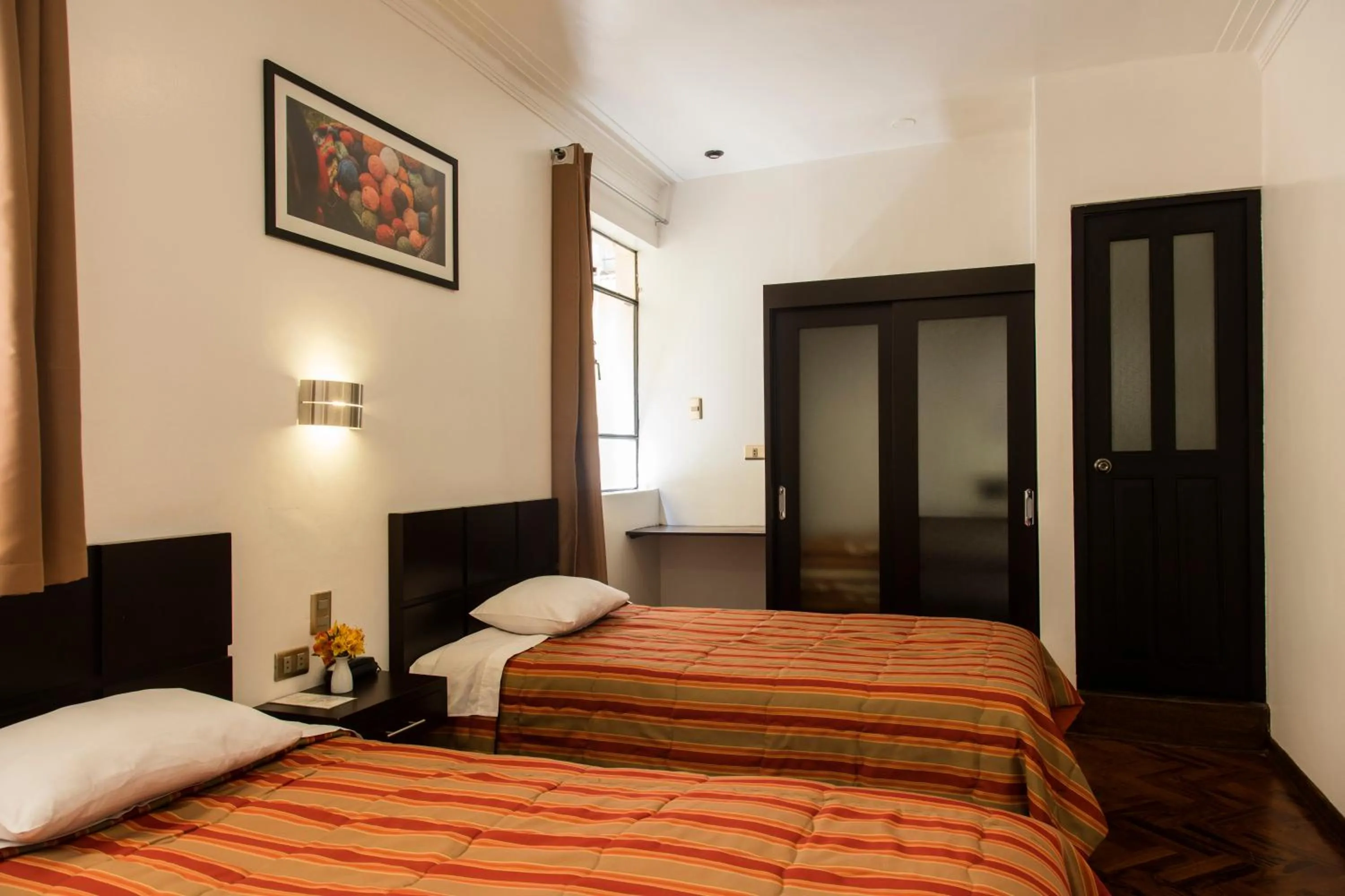 Photo of the whole room, Bed in Hostal & Apartments El Triunfo