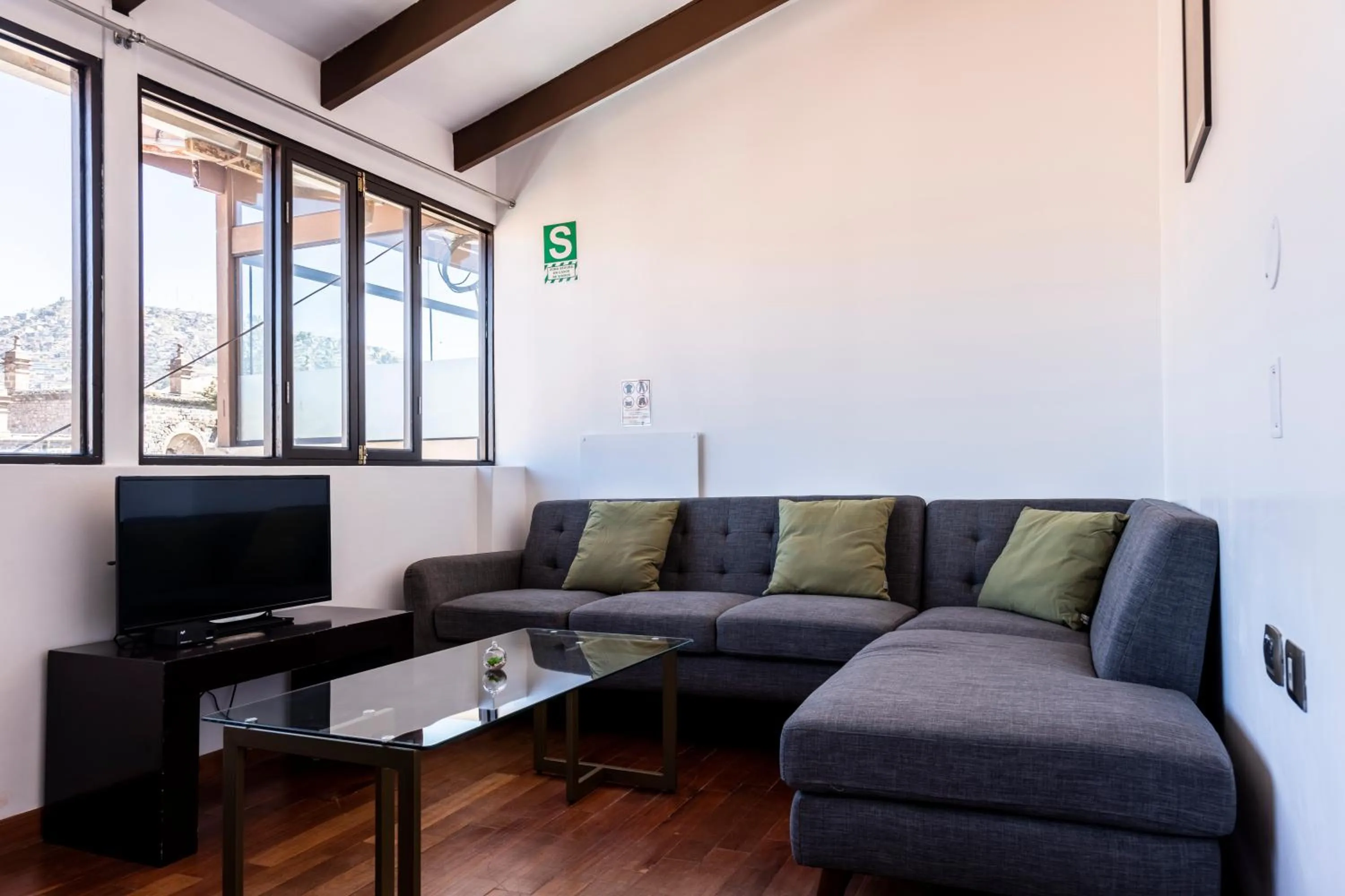 Living room in Hostal & Apartments El Triunfo