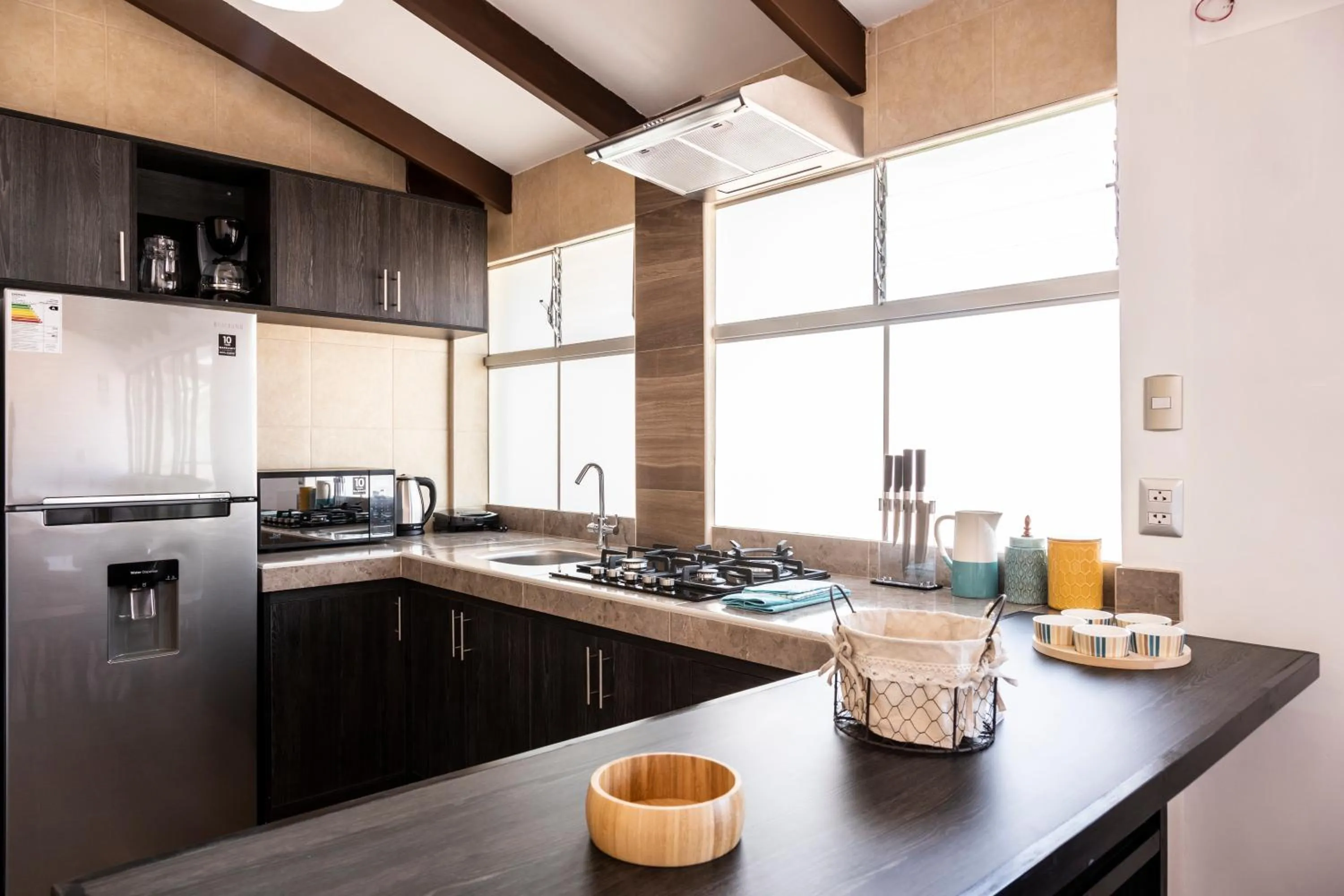 Kitchen or kitchenette in Hostal & Apartments El Triunfo