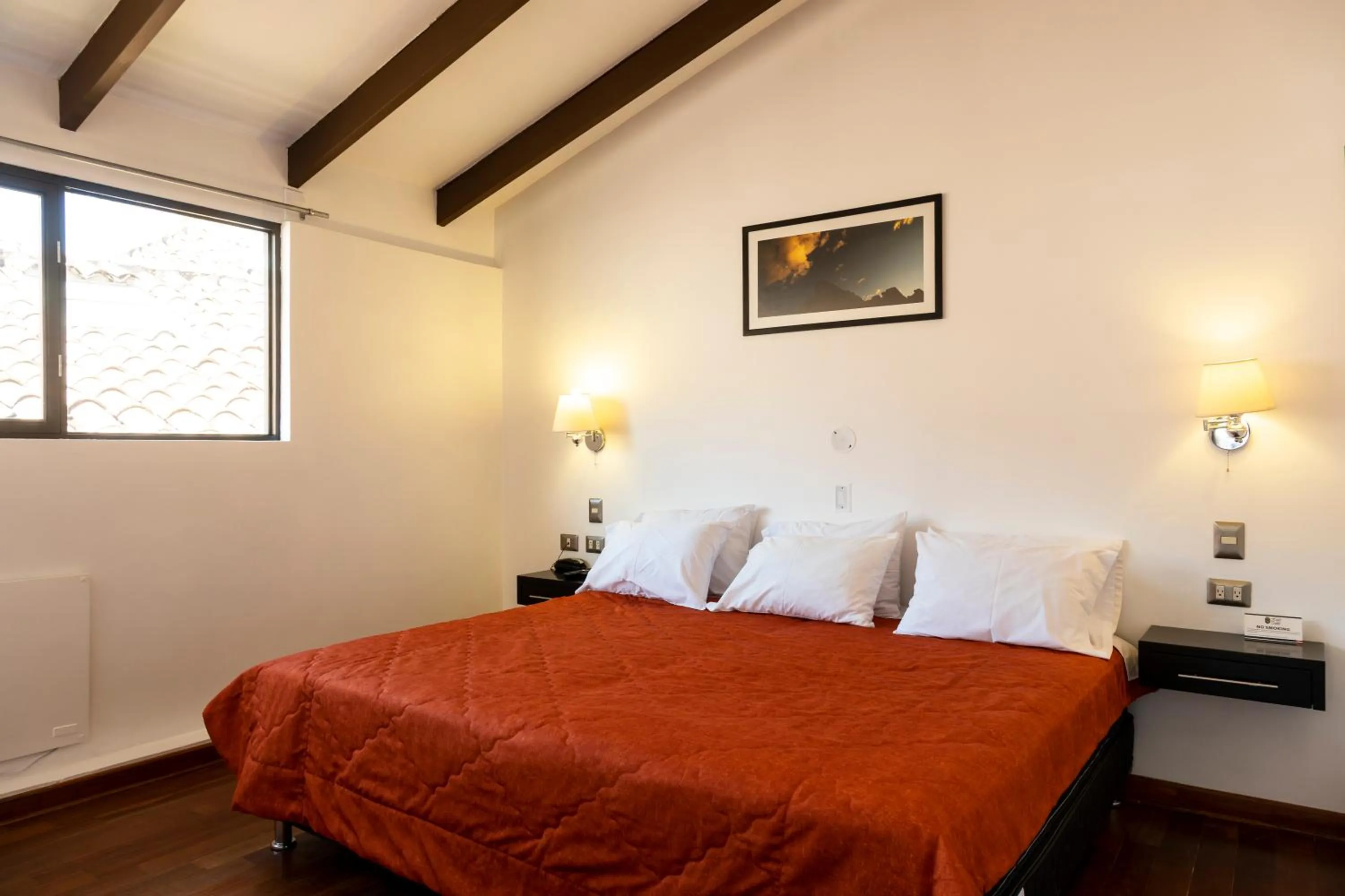 Photo of the whole room, Bed in Hostal & Apartments El Triunfo