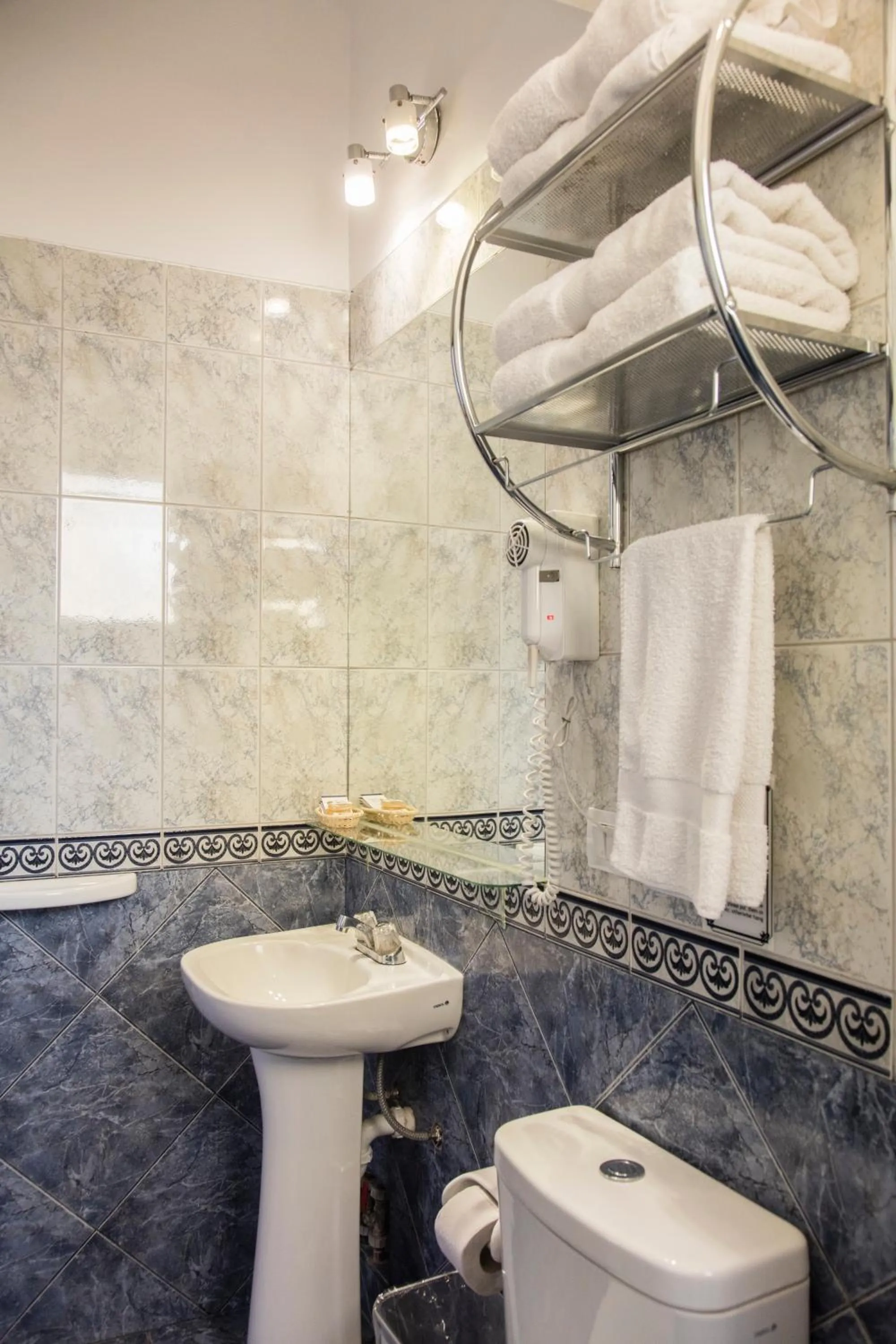 Bathroom in Hostal & Apartments El Triunfo