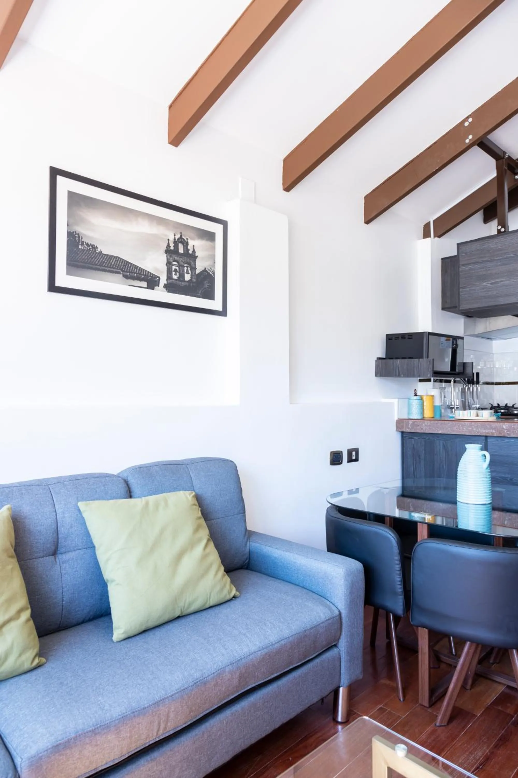 Kitchen or kitchenette in Hostal & Apartments El Triunfo