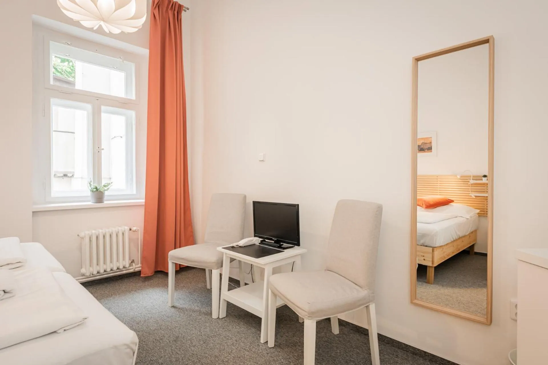 Seating area, Bed in Self-service Hotel Ostaš Praha