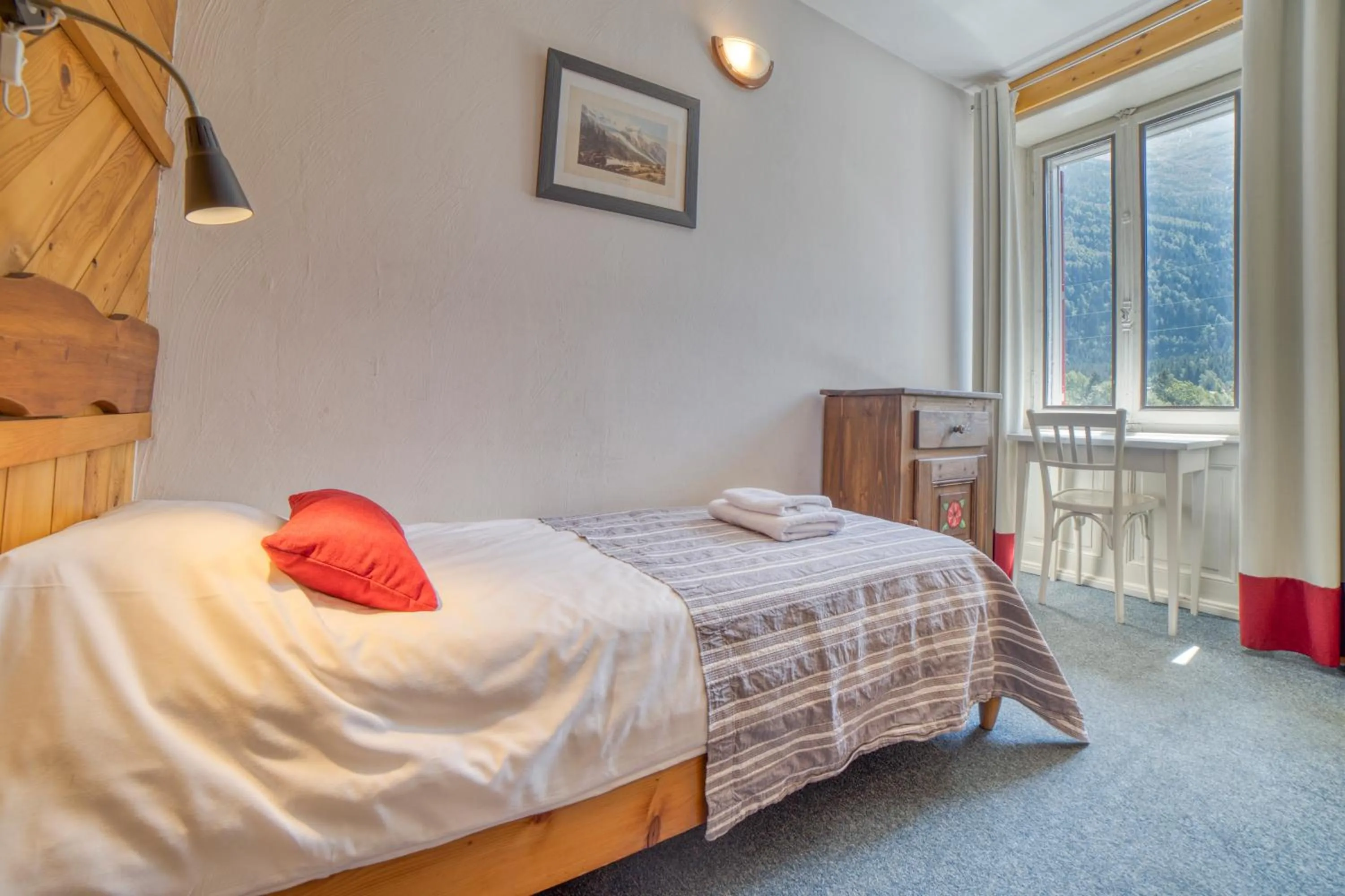 Bed in La Chaumière Mountain Lodge