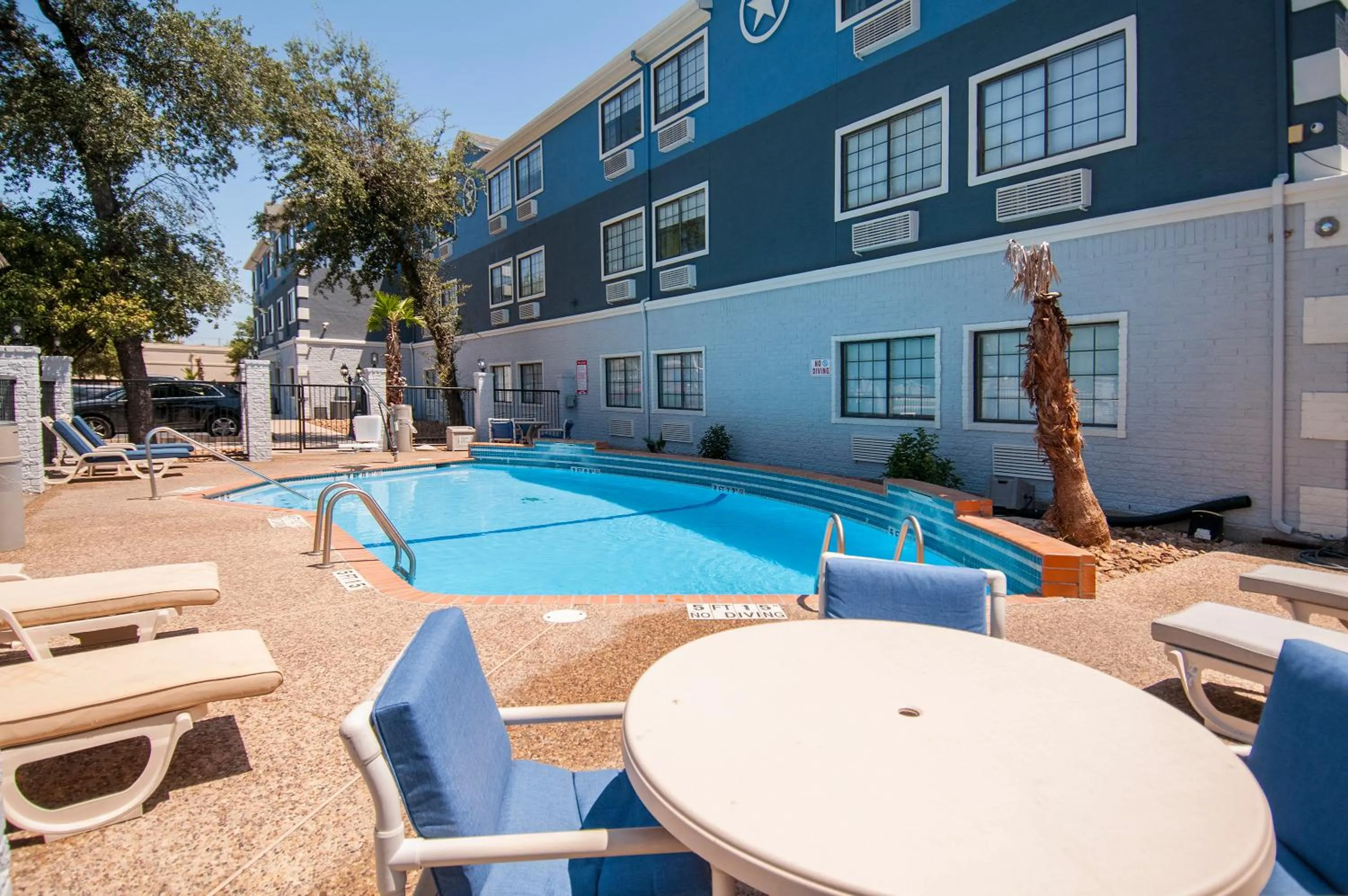 Swimming pool in Days Inn & Suites by Wyndham San Antonio North/Stone Oak
