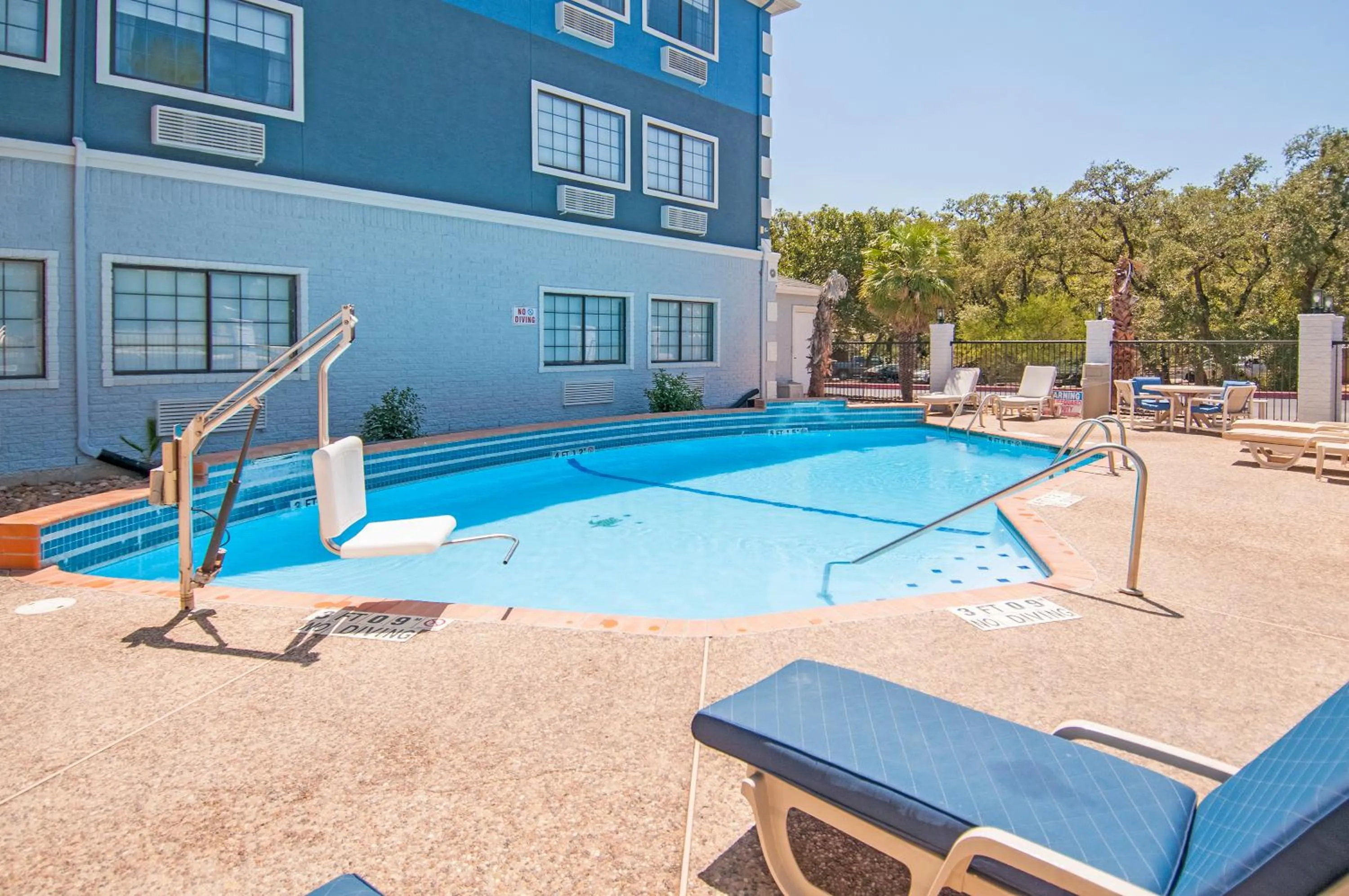 Swimming pool in Days Inn & Suites by Wyndham San Antonio North/Stone Oak