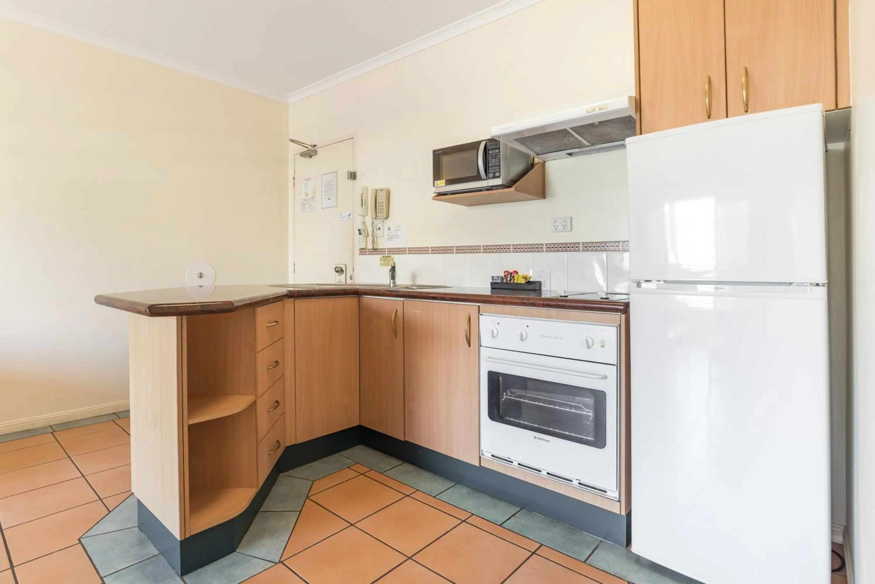 Kitchen or kitchenette in Mid City Luxury Suites