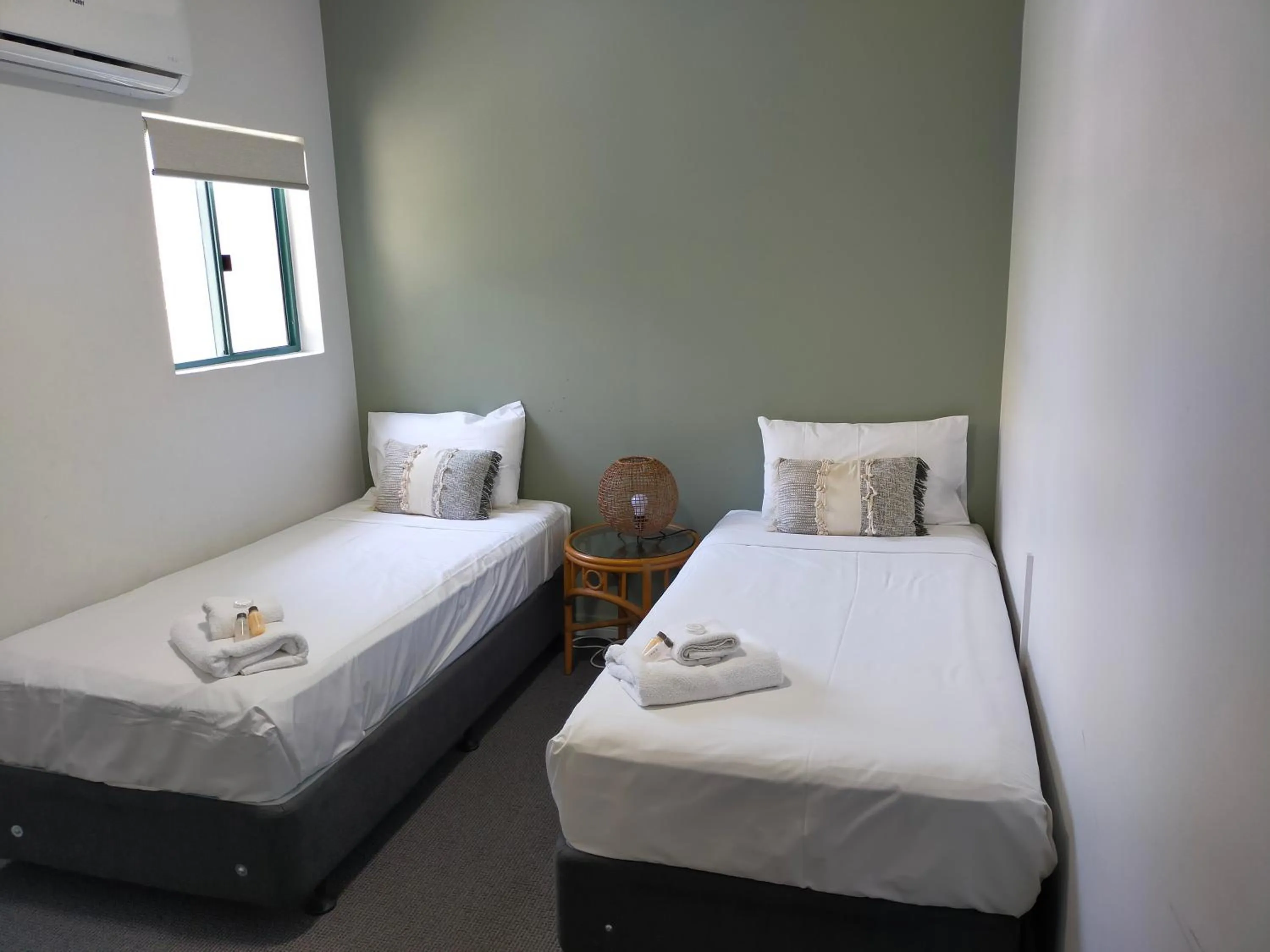 Bedroom, Bed in Mid City Luxury Suites