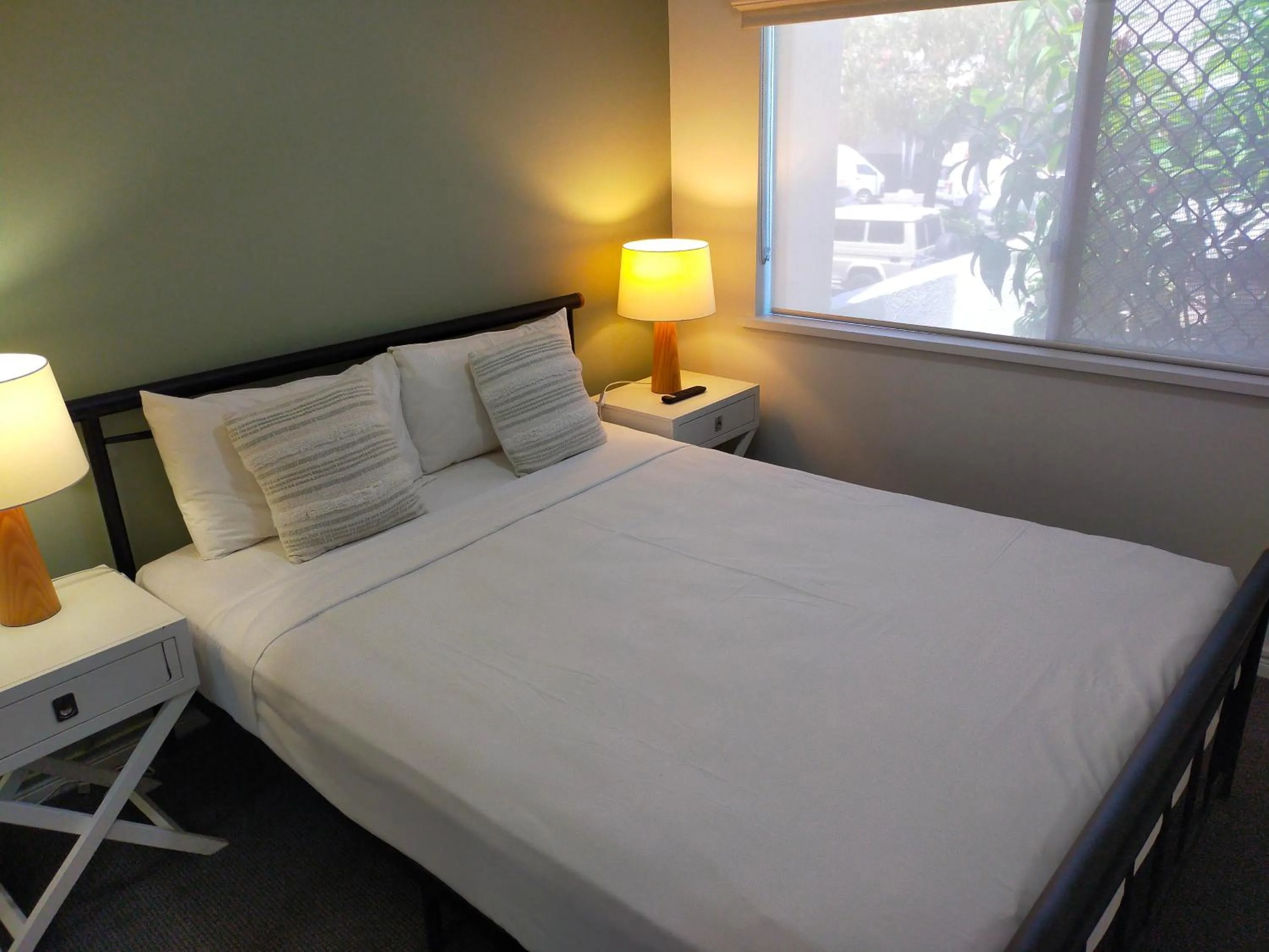 Bedroom, Bed in Mid City Luxury Suites