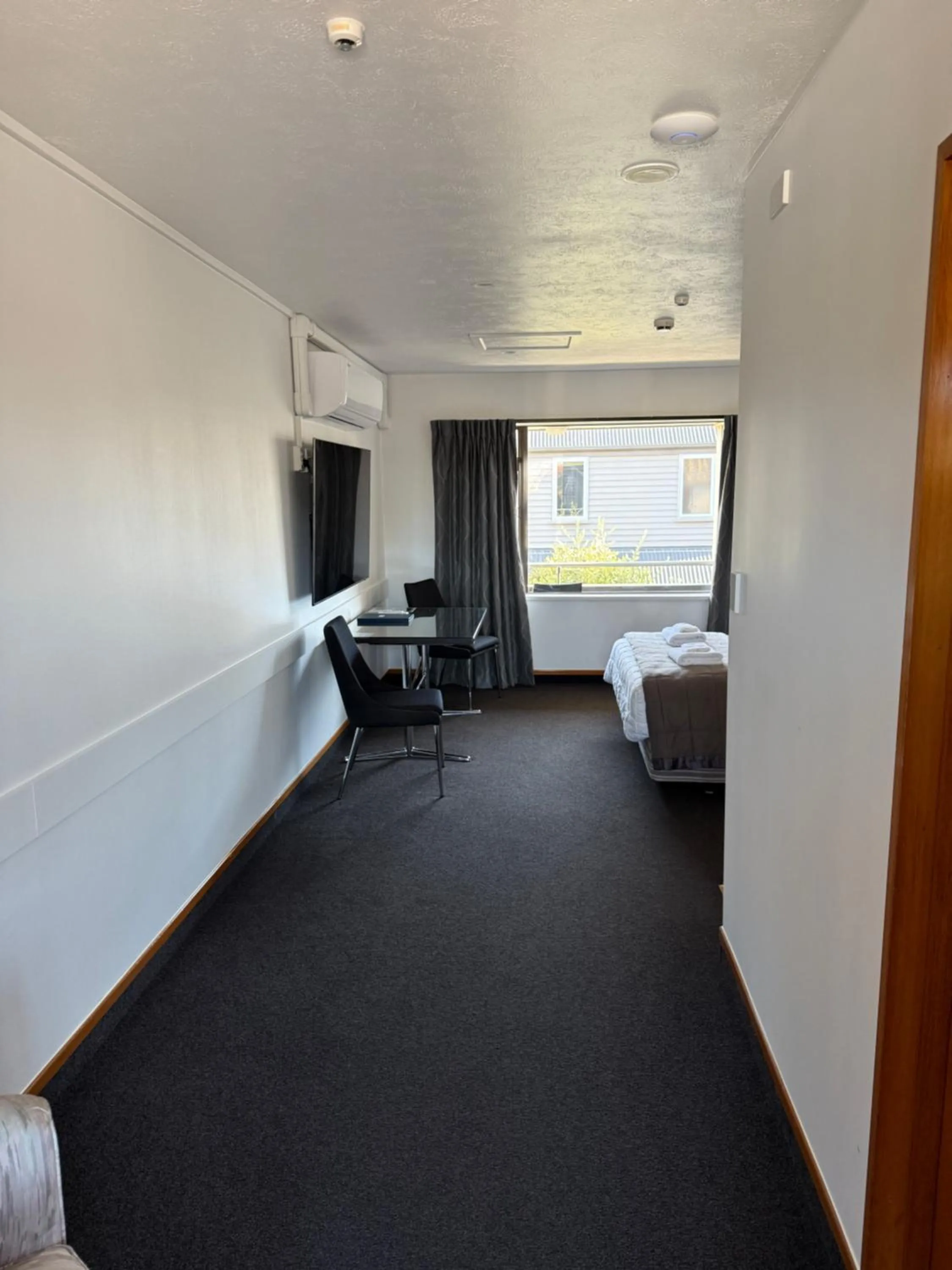 Bed in Airport Gateway Hotel