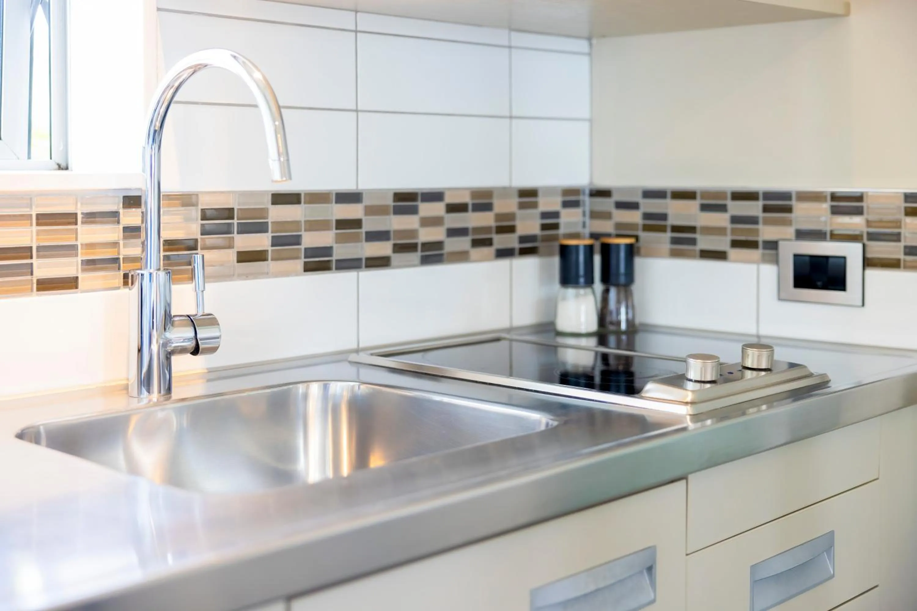 Kitchen or kitchenette in Airport Gateway Hotel