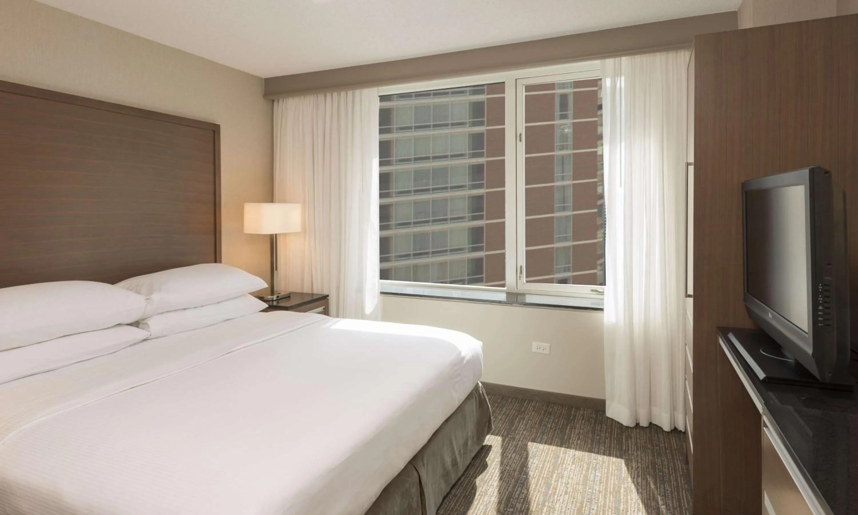 Bed in Embassy Suites by Hilton Chicago Downtown Magnificent Mile