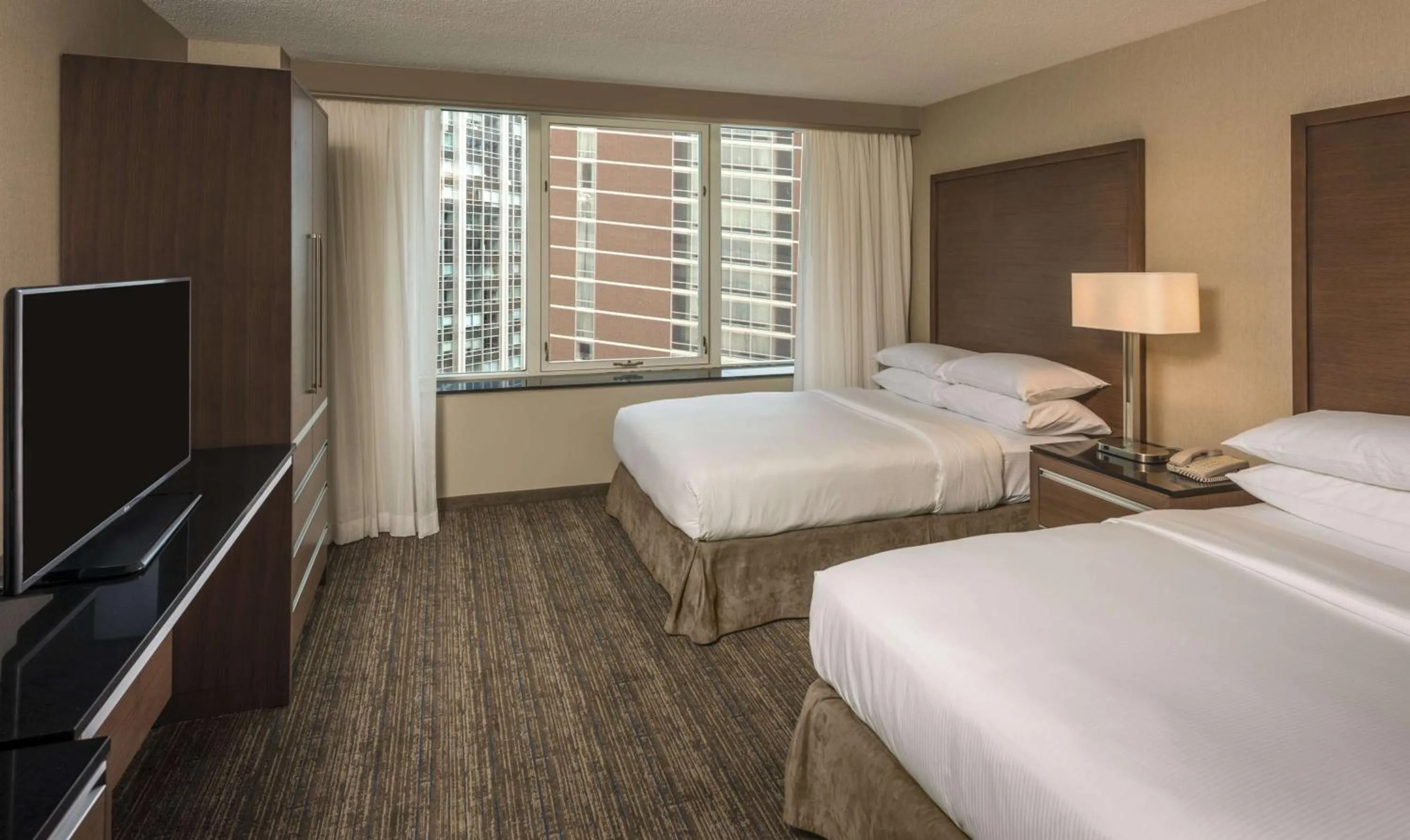 Bed in Embassy Suites by Hilton Chicago Downtown Magnificent Mile