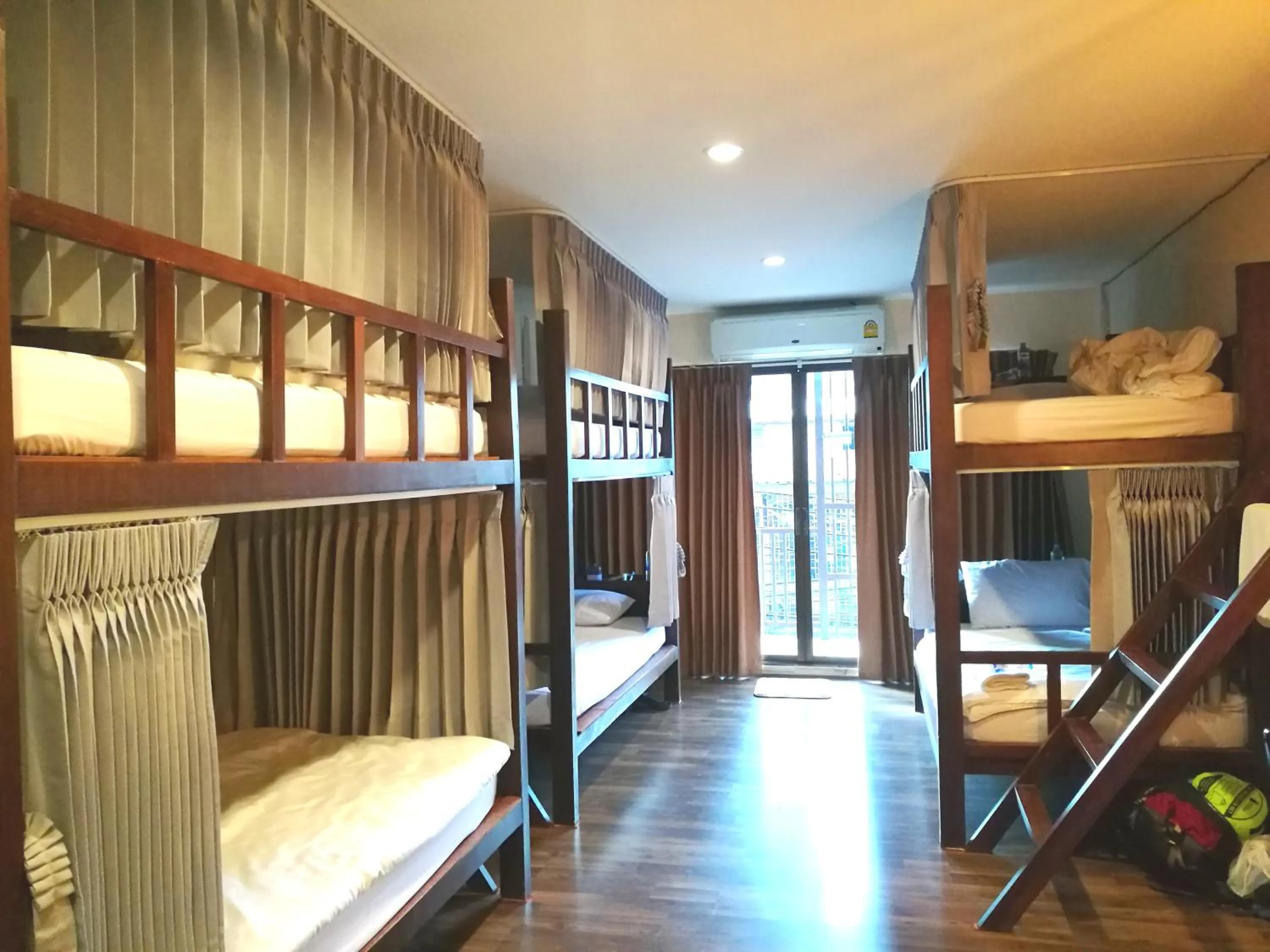 Photo of the whole room, Bed in Phobphan Hostel