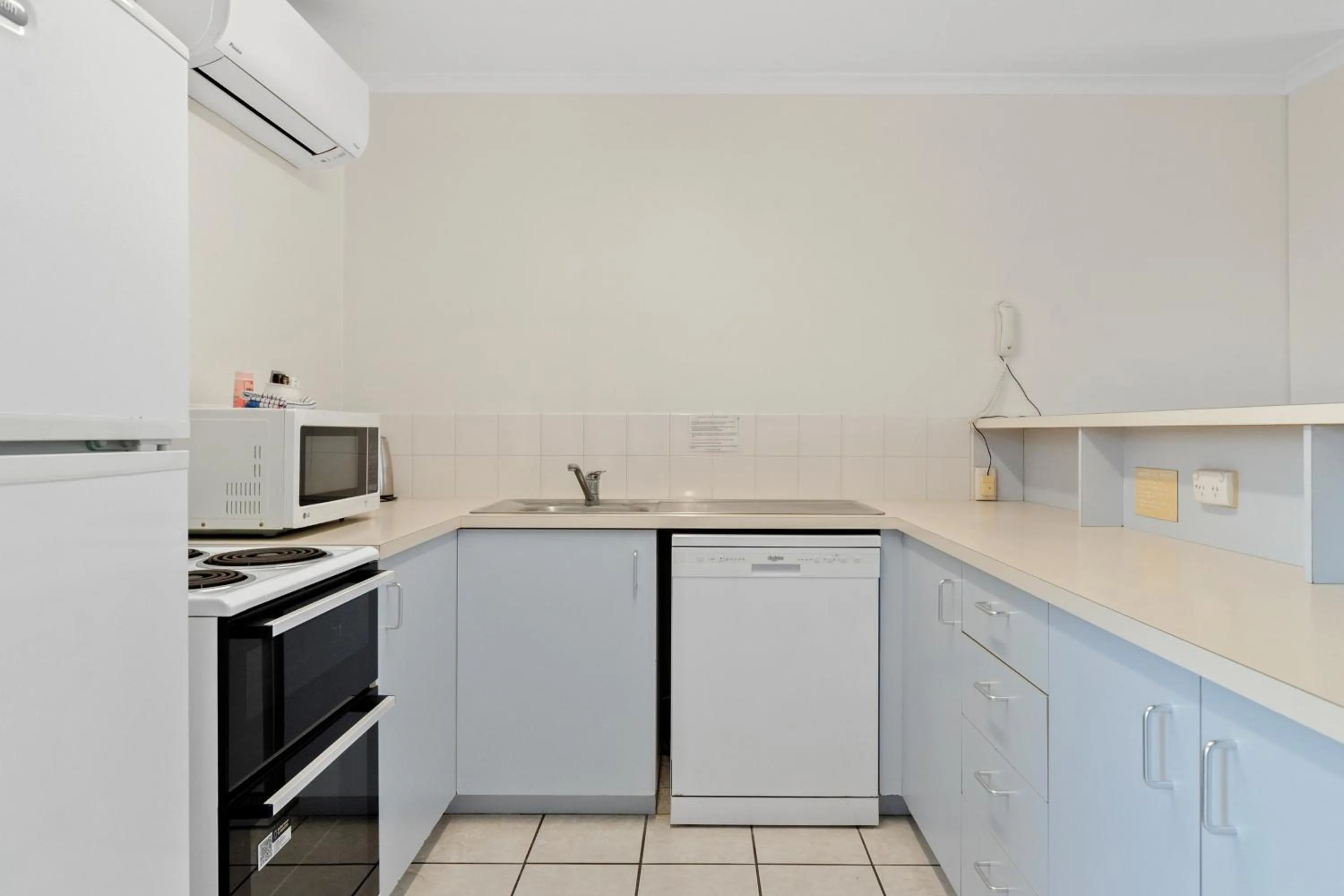 Kitchen or kitchenette in Beach Breakers Resort