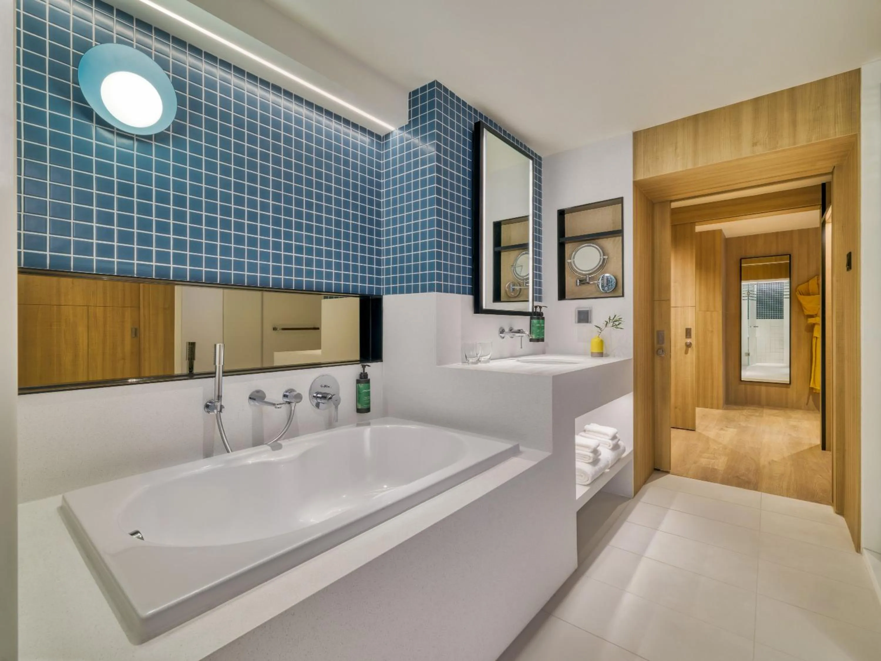Bathroom in voco Bangkok Surawong by IHG