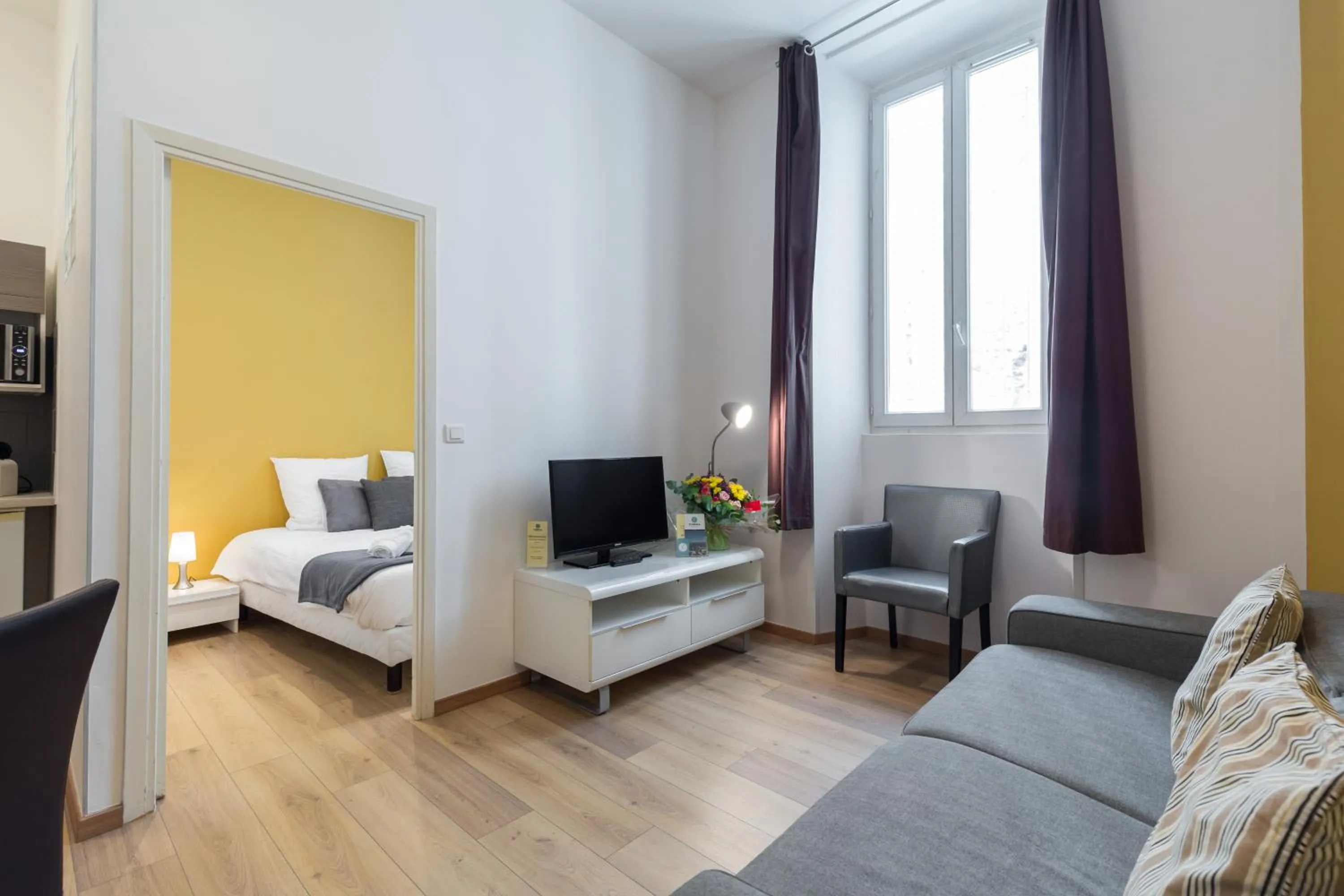 Living room, Bed in Florella Marceau Apartment