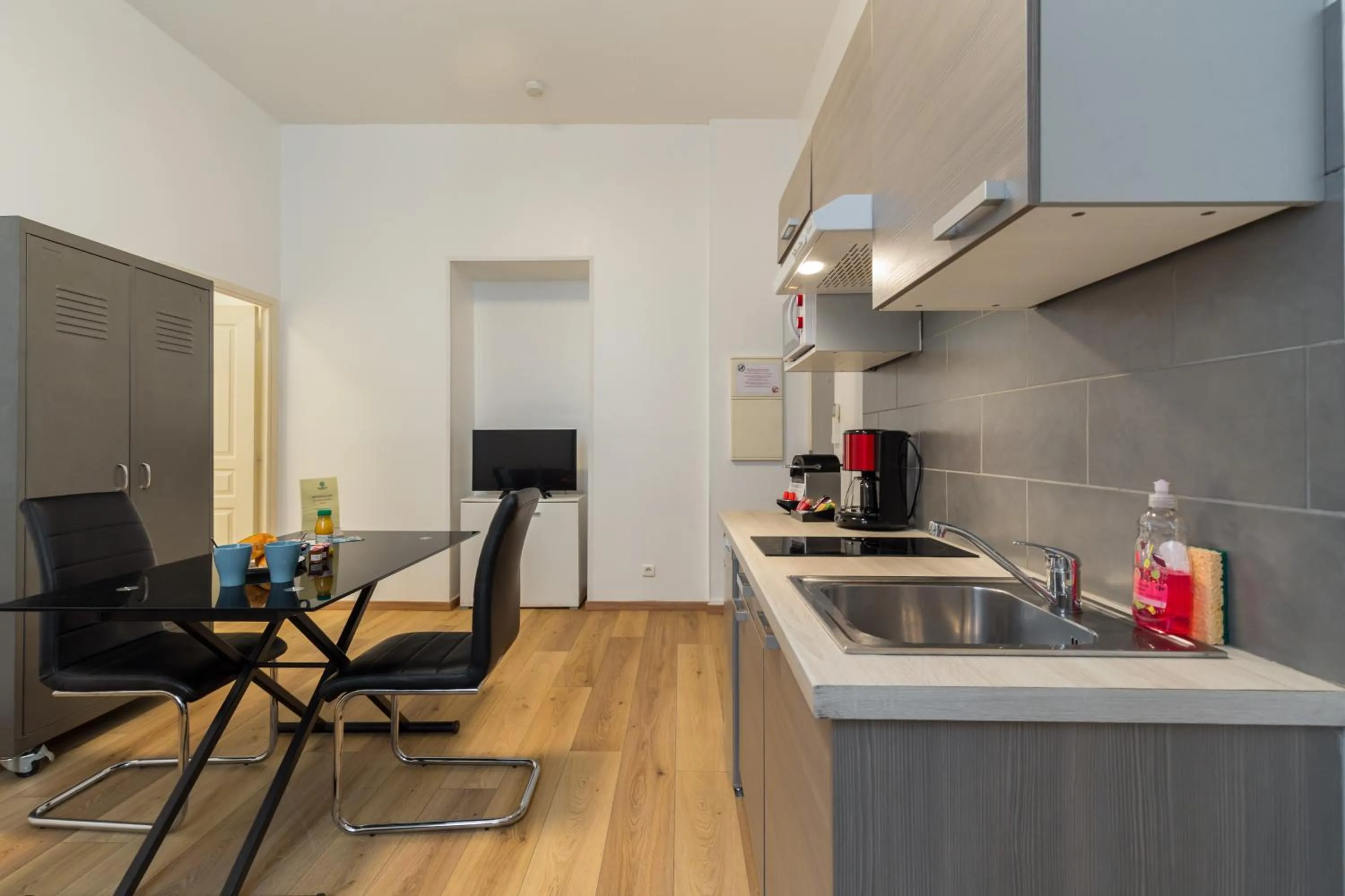 Kitchen or kitchenette in Florella Marceau Apartment