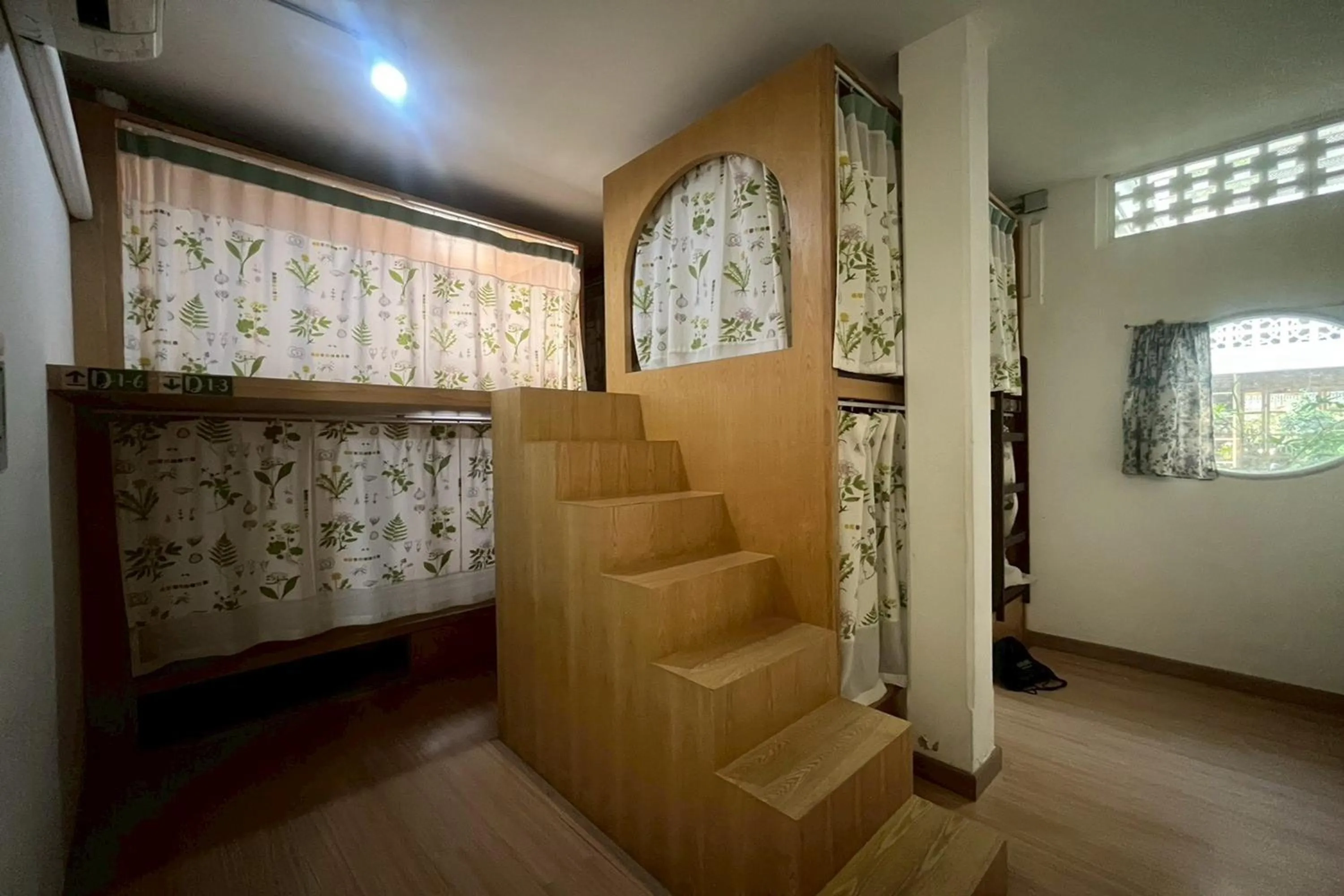 Bedroom in Memmoth Cafe & Hostel in Lampang