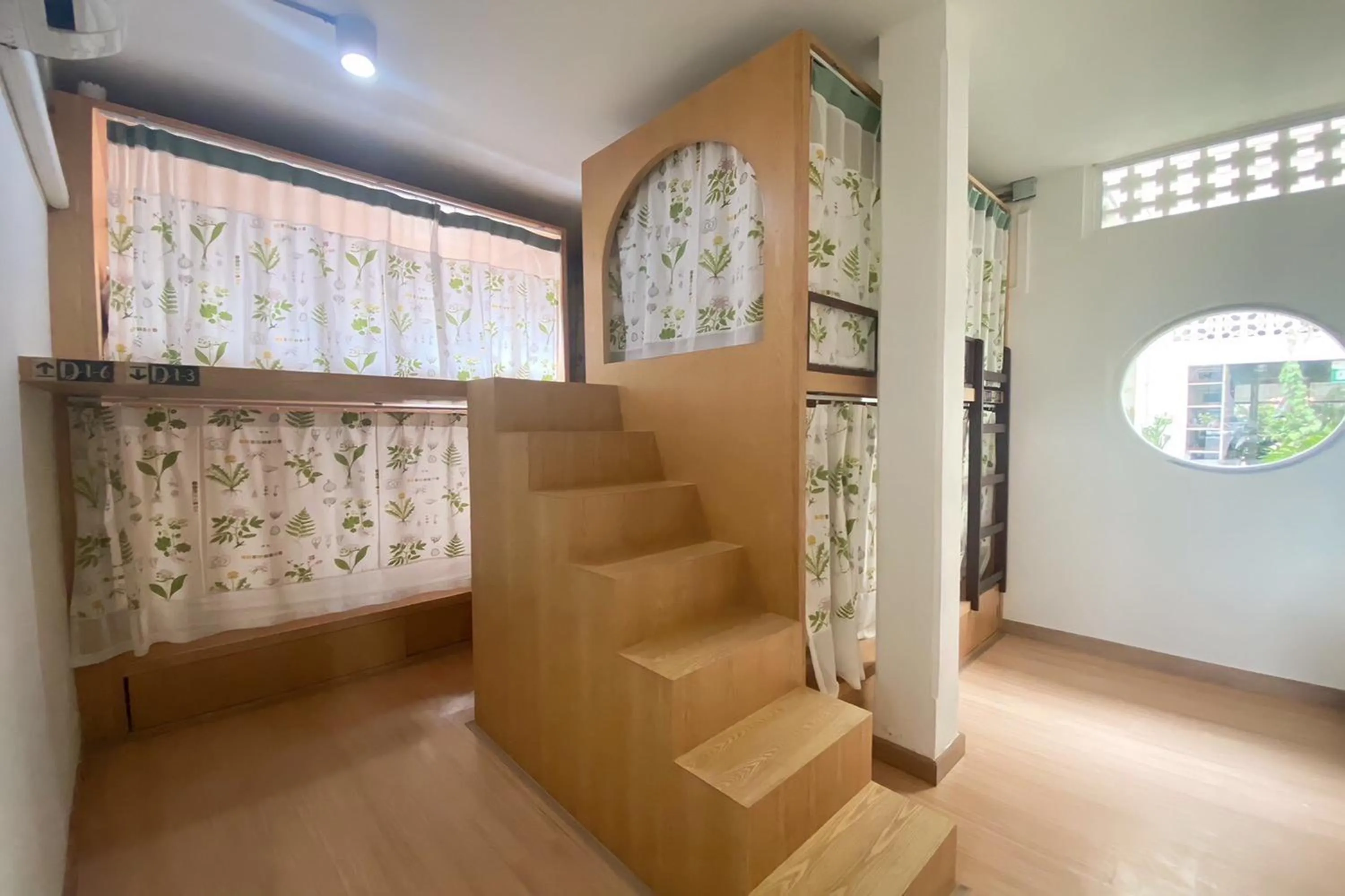 Bedroom in Memmoth Cafe & Hostel in Lampang