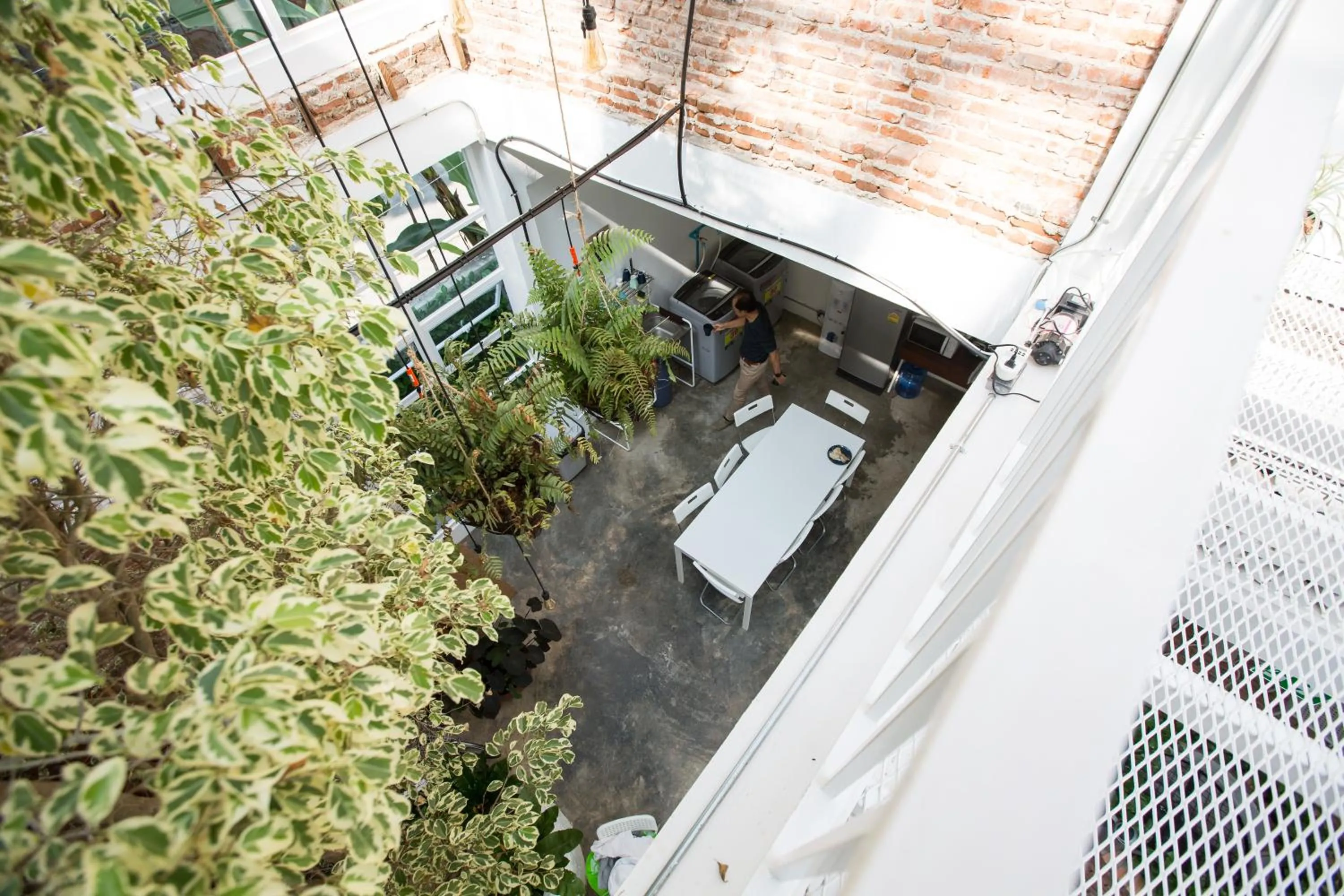 Kitchen or kitchenette in Memmoth Hostel In Lampang