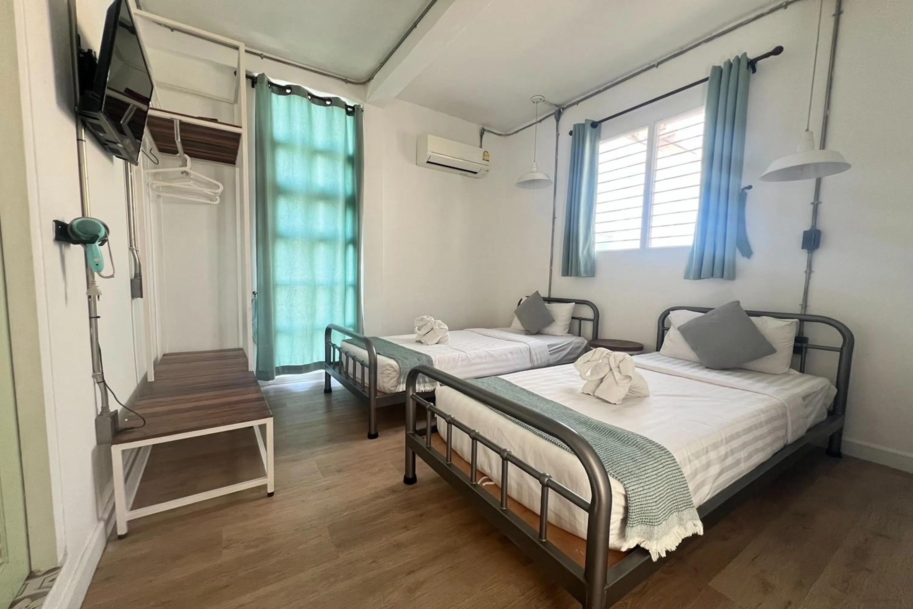 Photo of the whole room, Bed in Memmoth Cafe & Hostel in Lampang