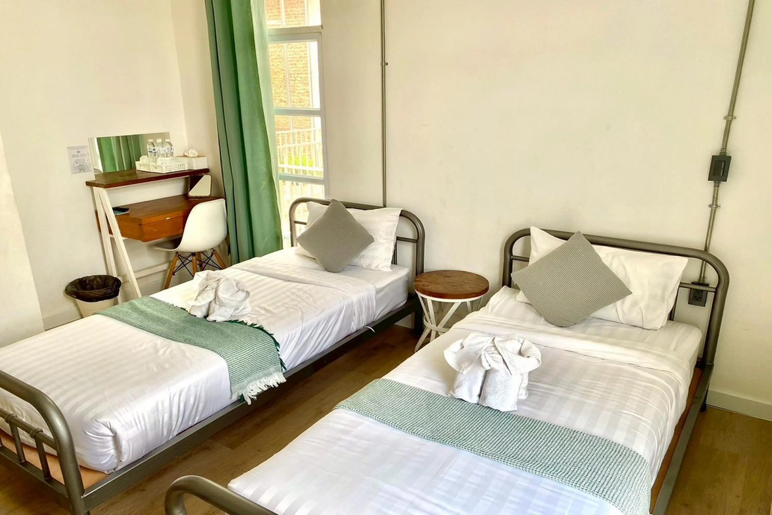 Photo of the whole room, Bed in Memmoth Cafe & Hostel in Lampang