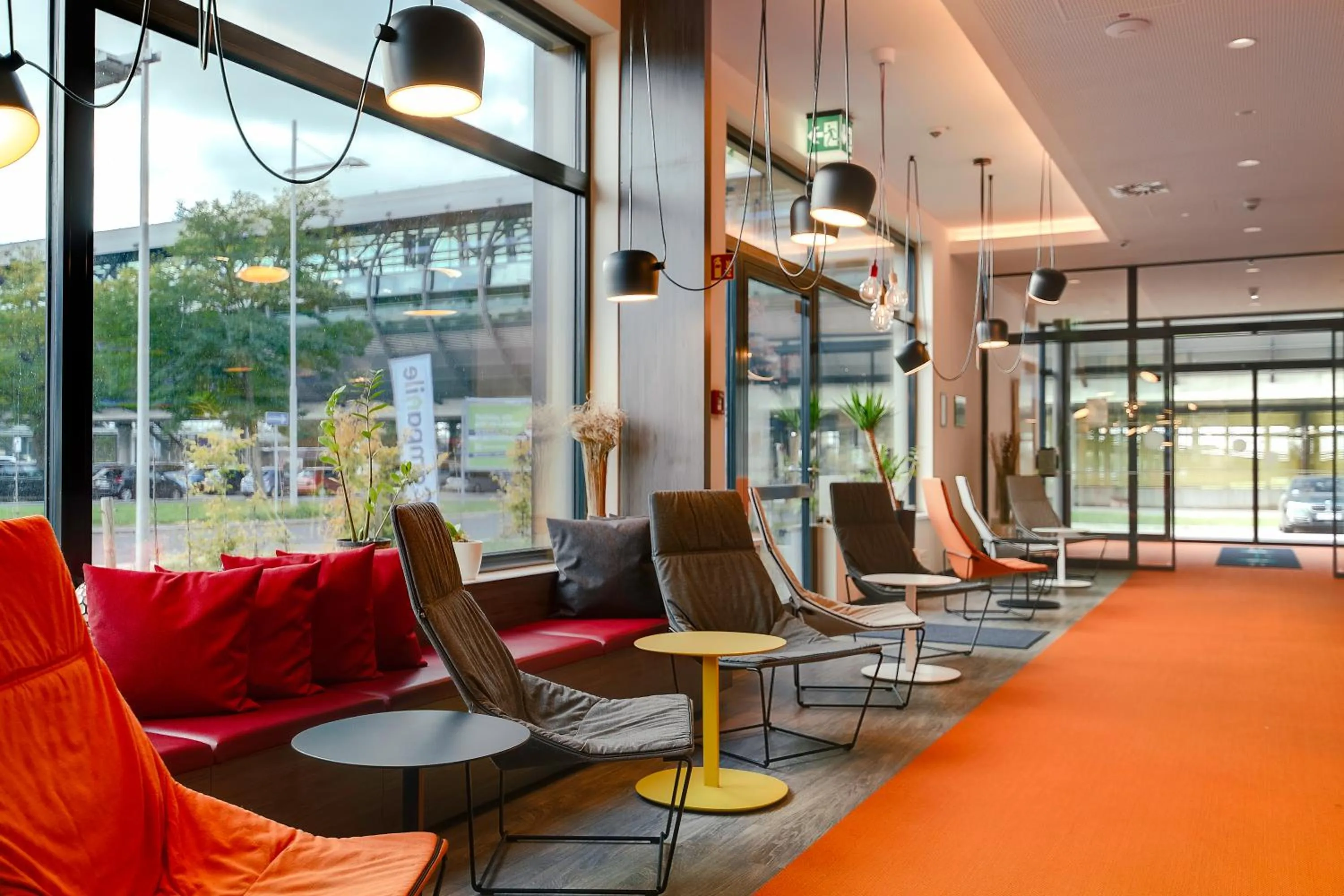 Lobby or reception in Campanile Leipzig Halle Airport
