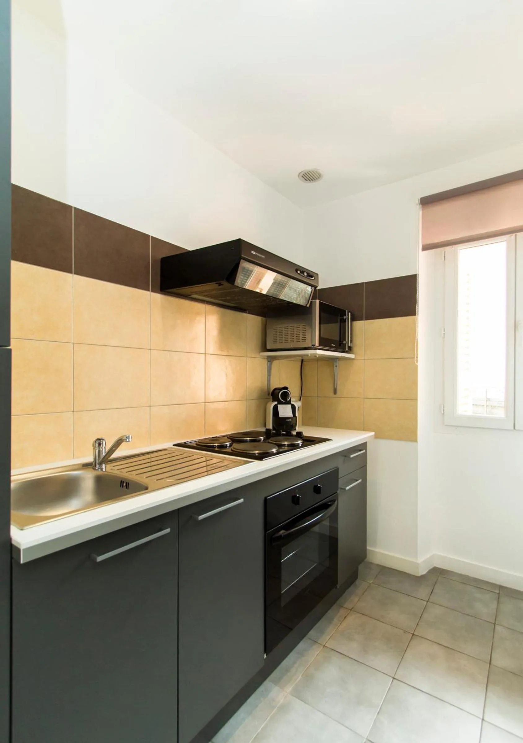 Kitchen or kitchenette in Florella Achard Apartment
