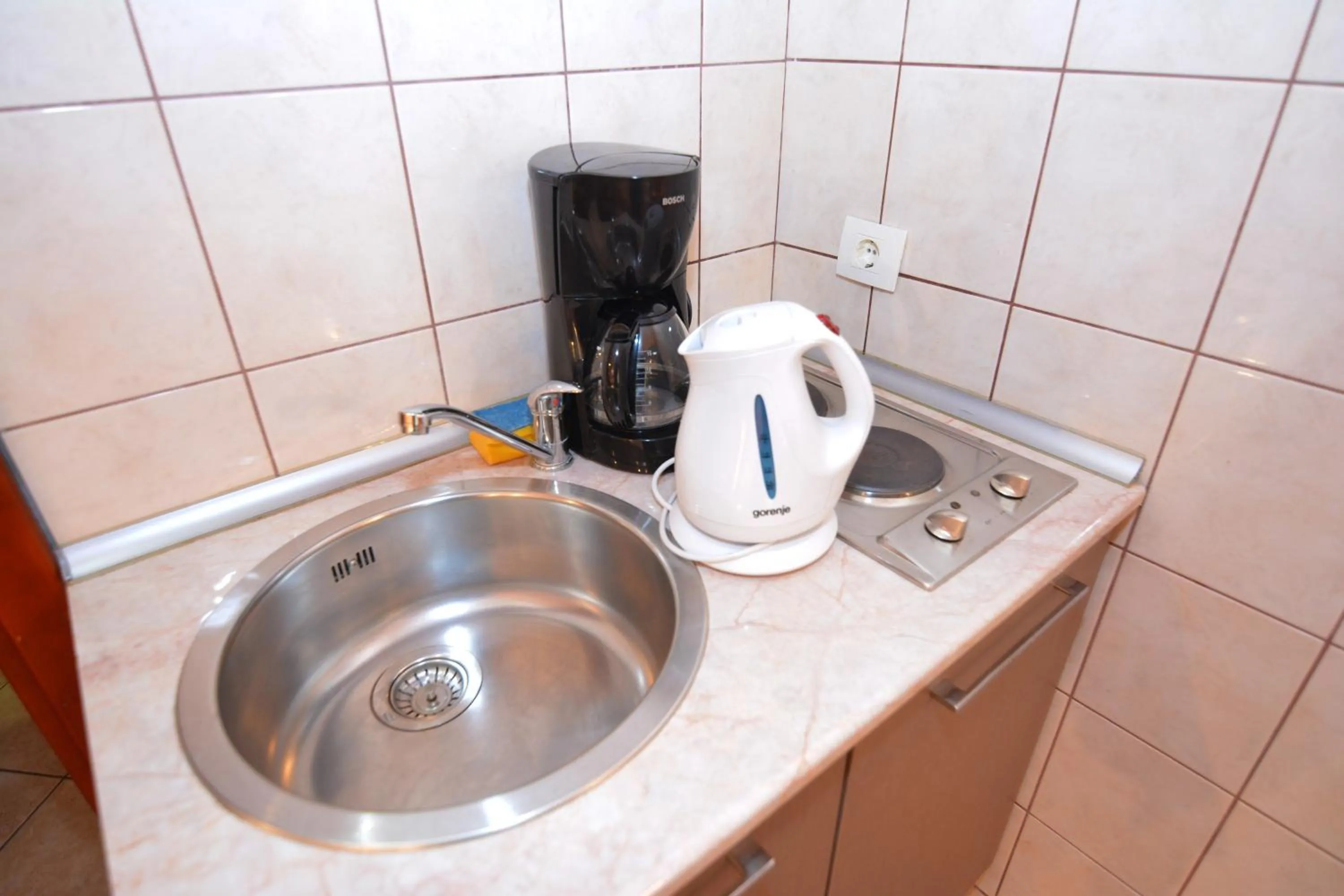 Kitchen or kitchenette in Apartments Bogdanovic