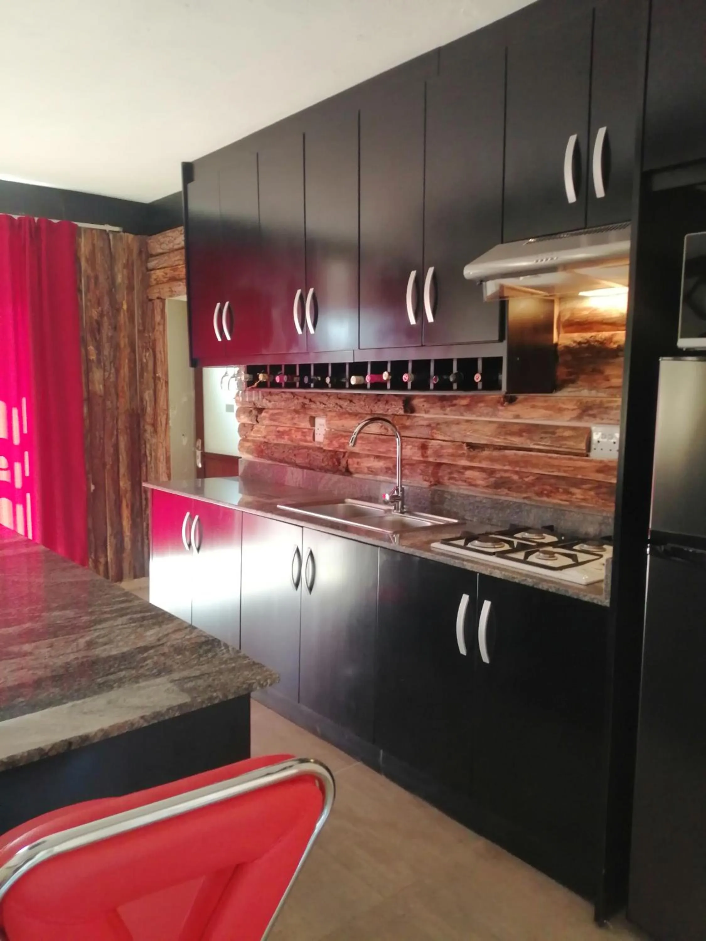 Kitchen or kitchenette in CommonLens Inn