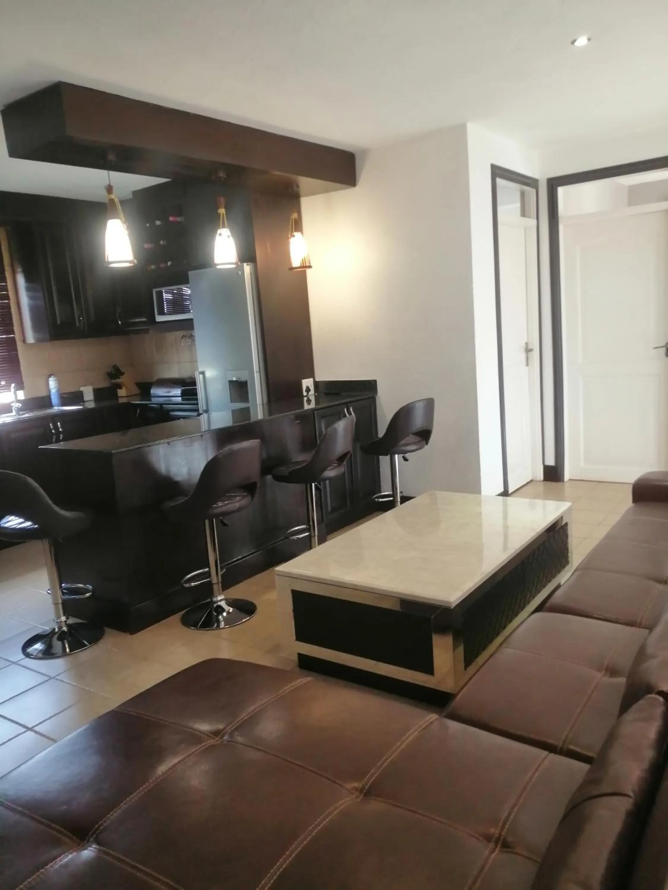 Lounge or bar in CommonLens Inn