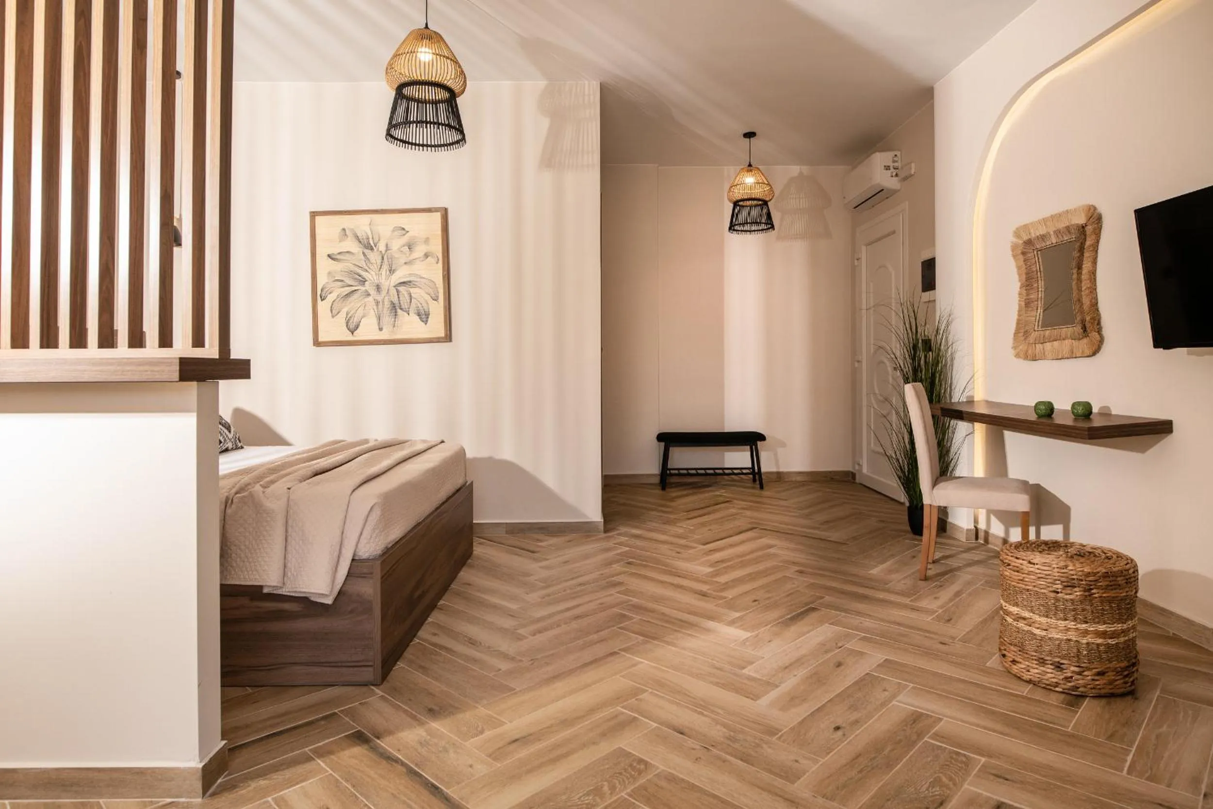 Bed in Aeolos Boutique Hotel & Suites