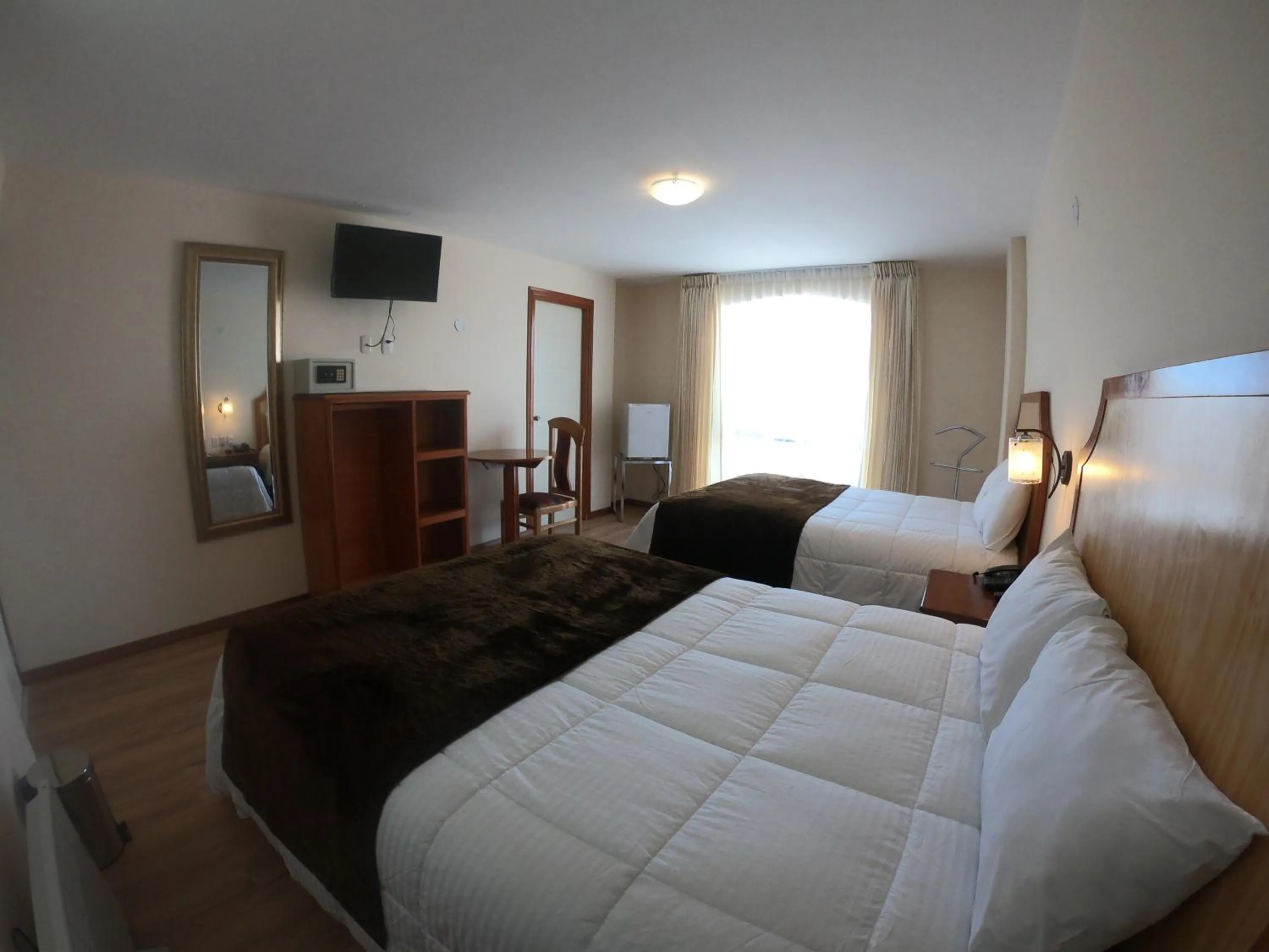 Bed in Sol Plaza Hotel