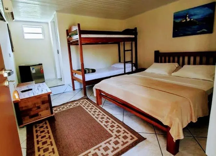 Bed in Complexo de Pousadas Caraguatá