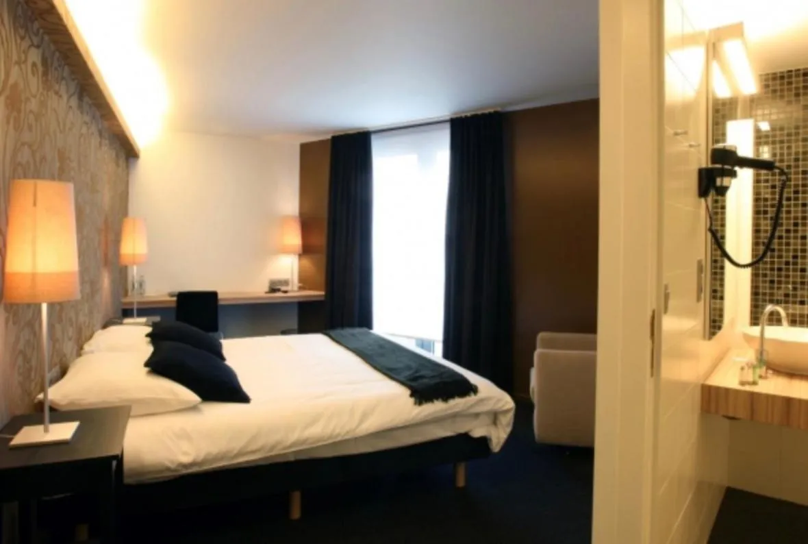 Bed in Hotel De Groene Hendrickx