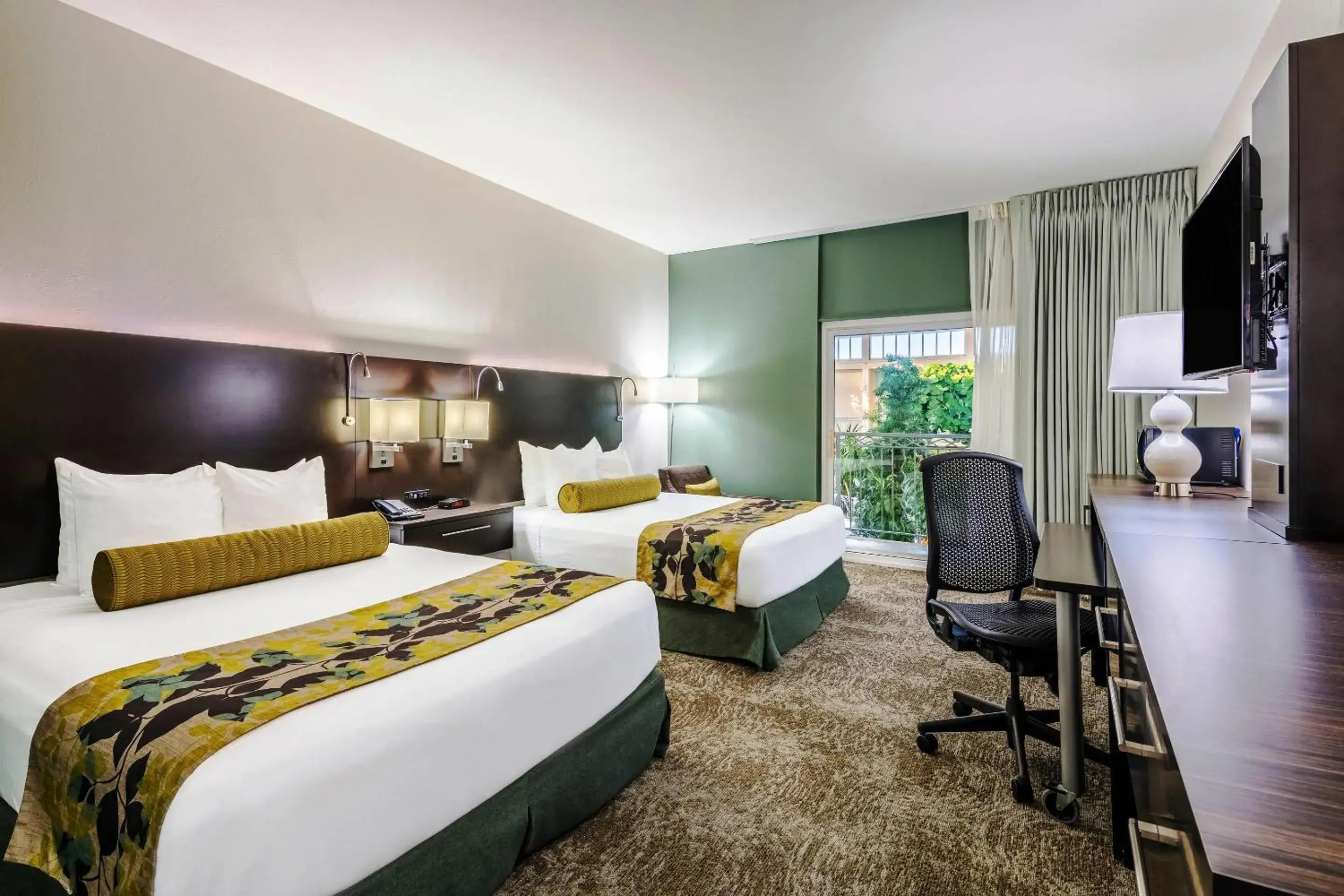 Queen Room with Two Queen Beds and Pool View - Non-Smoking in Oasis Hotel and Conv Center, an Ascend Collection Hotel Queen Room with Two Queen Beds and Pool View - Non-Smoking in Oasis Hotel and Conv Center, an Ascend Collection Hotel