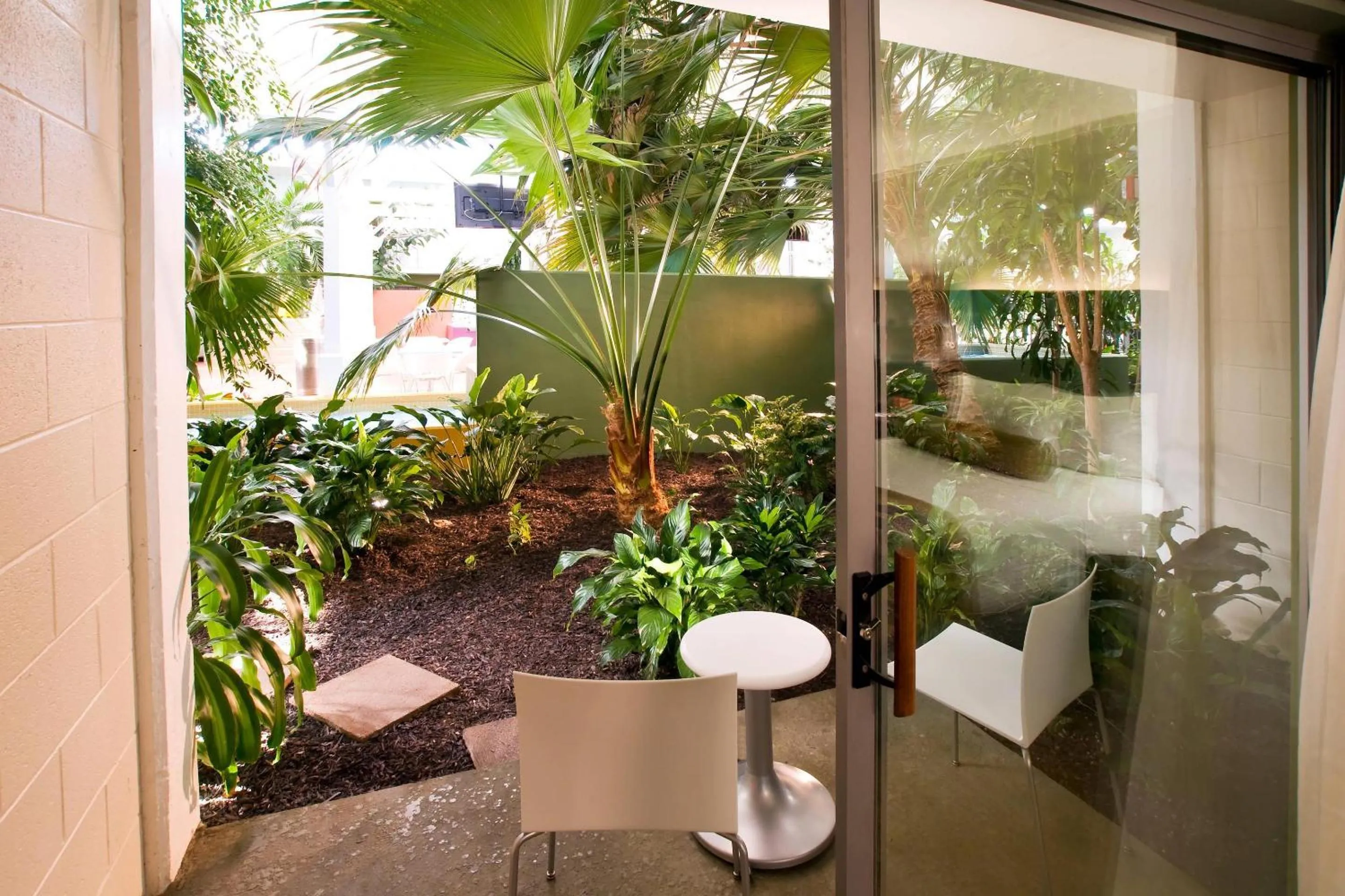 Bedroom in Oasis Hotel and Conv Center, an Ascend Collection Hotel
