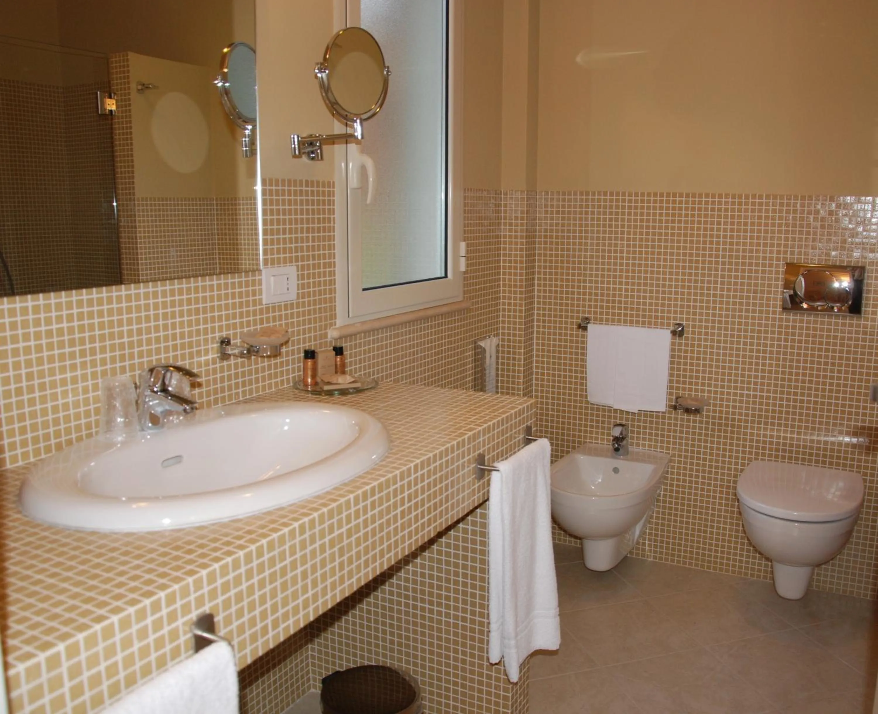 Bathroom in Alcantara Resort di Charme Adults Only