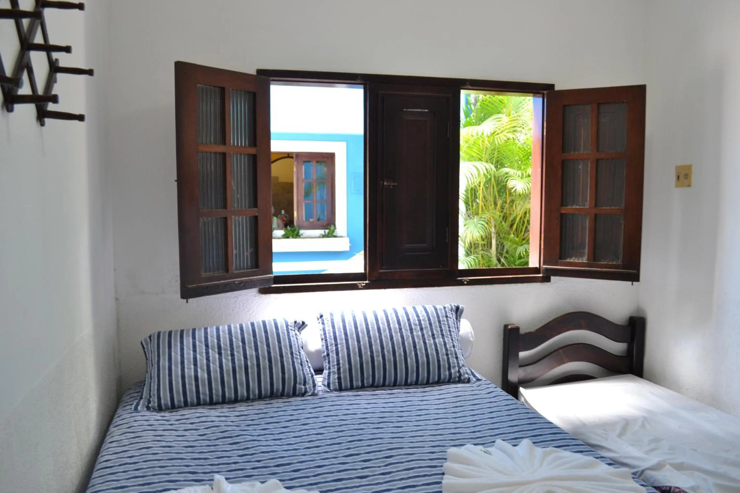 Bed in Pousada Morada Azul
