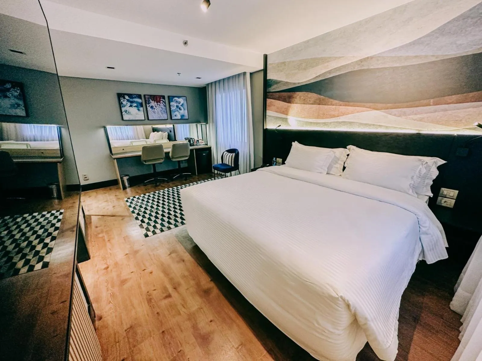 Bed in ArtHotel Transamerica Collection