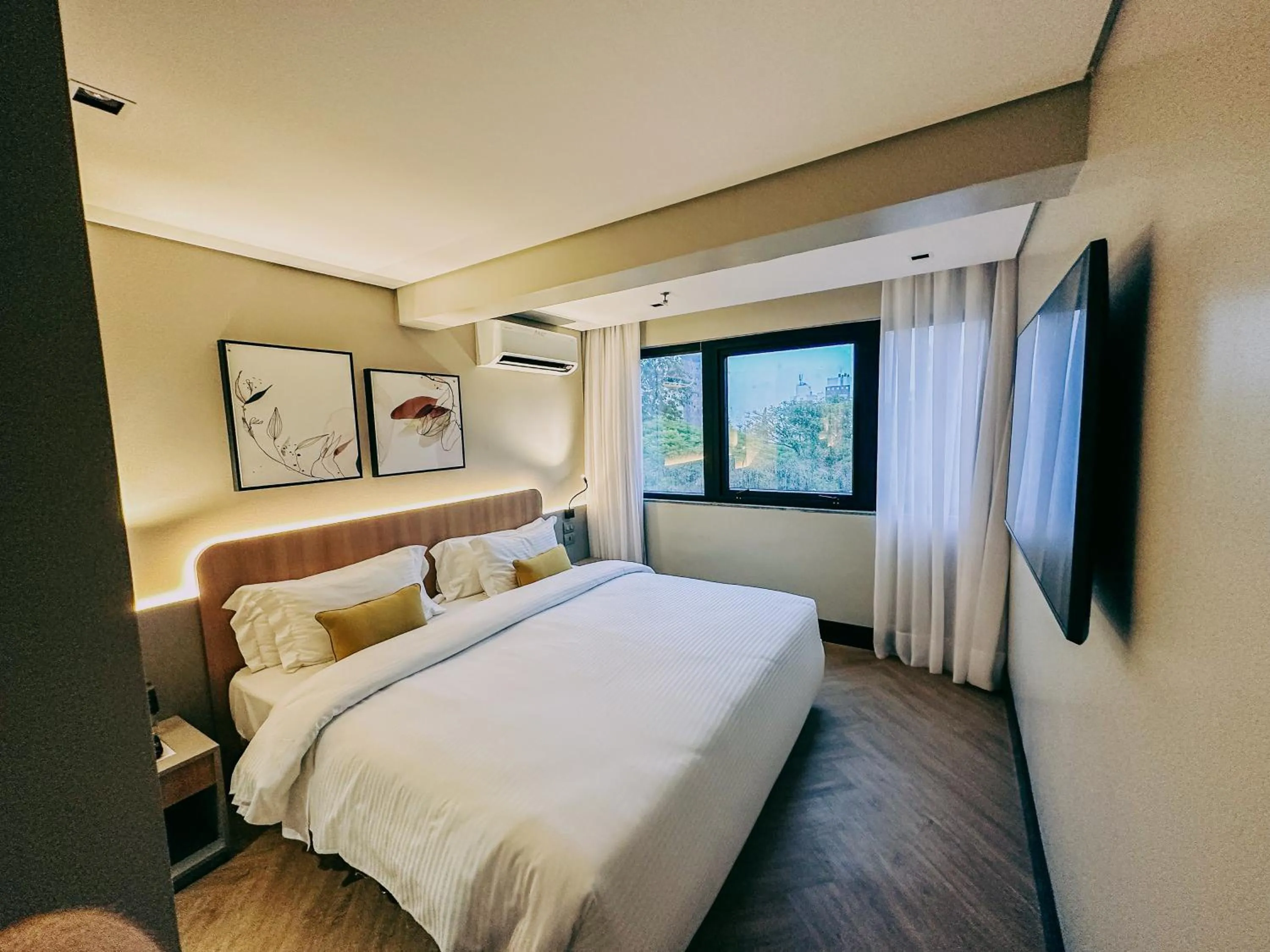 Bed in ArtHotel Transamerica Collection