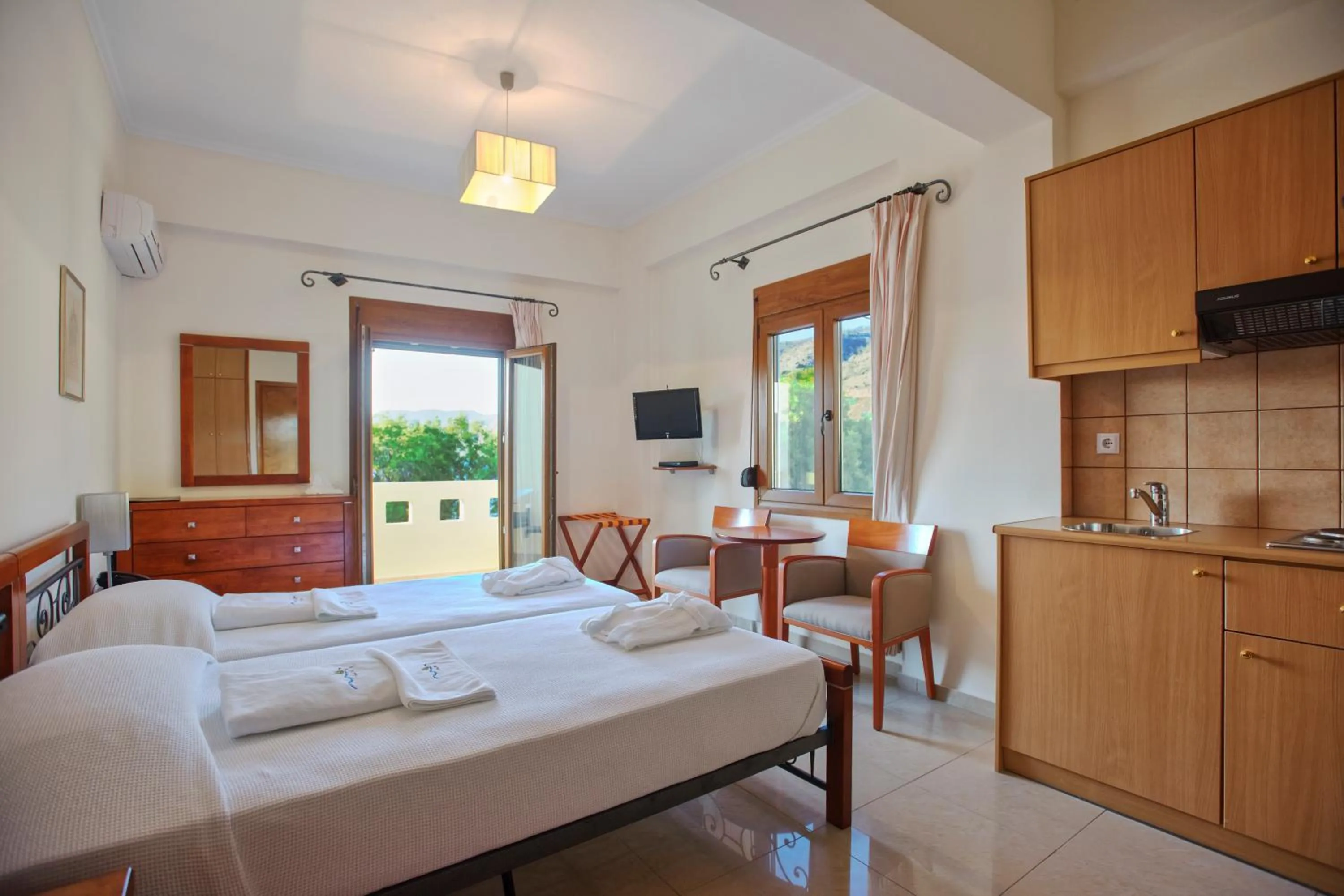 Bed in Almiriki Chios Rooms & Apartments