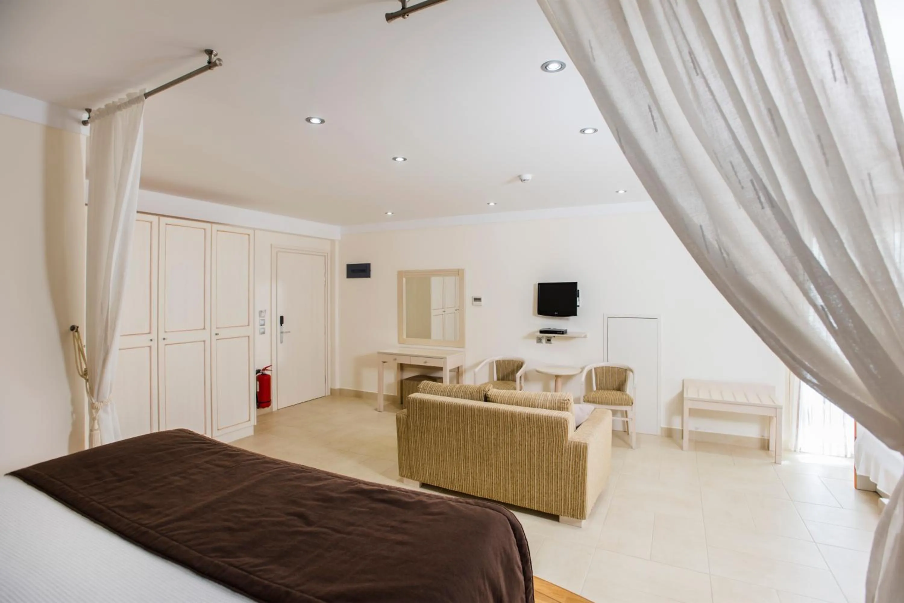 Photo of the whole room, Bed in Almiriki Chios Rooms & Apartments