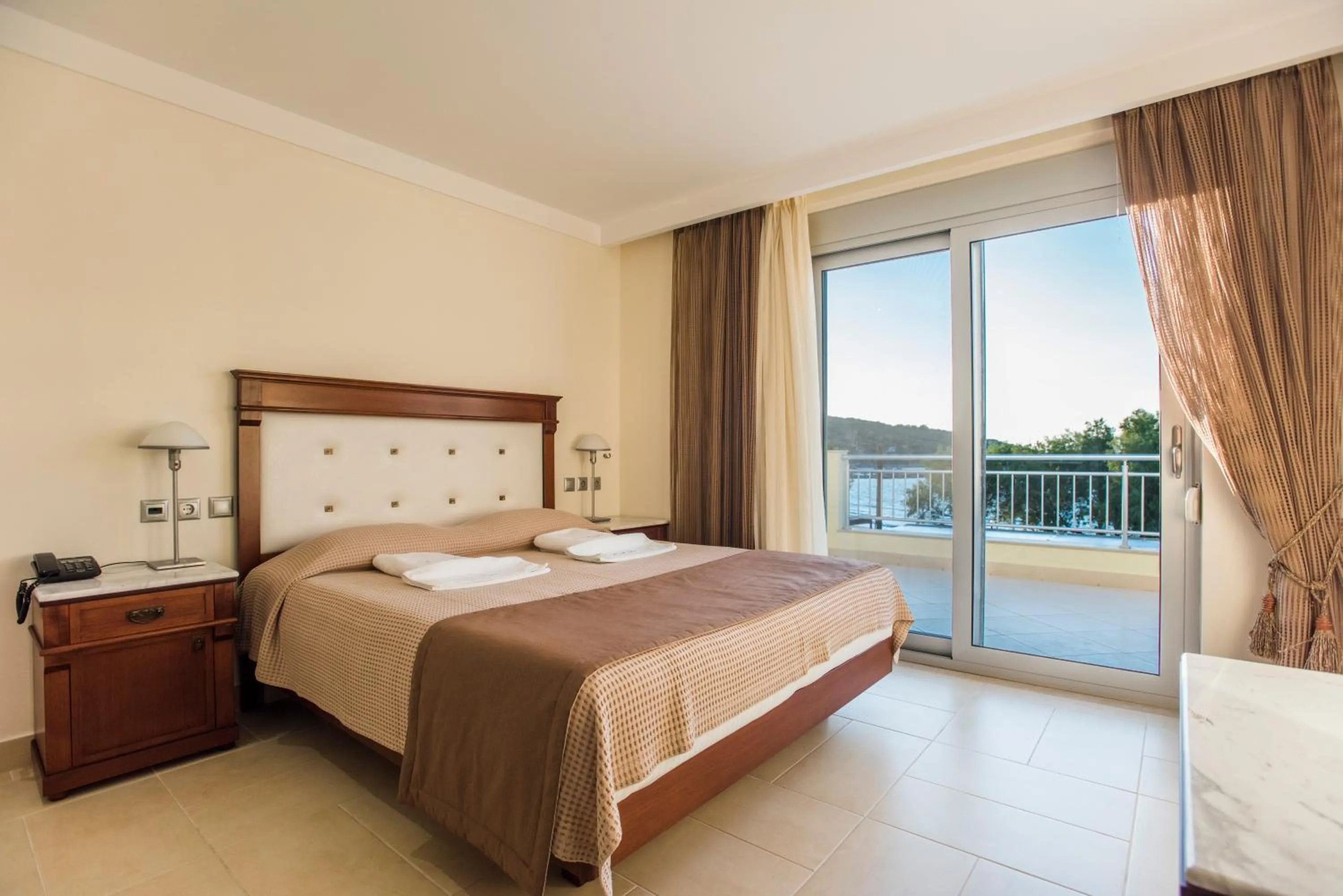 Bed in Almiriki Chios Rooms & Apartments